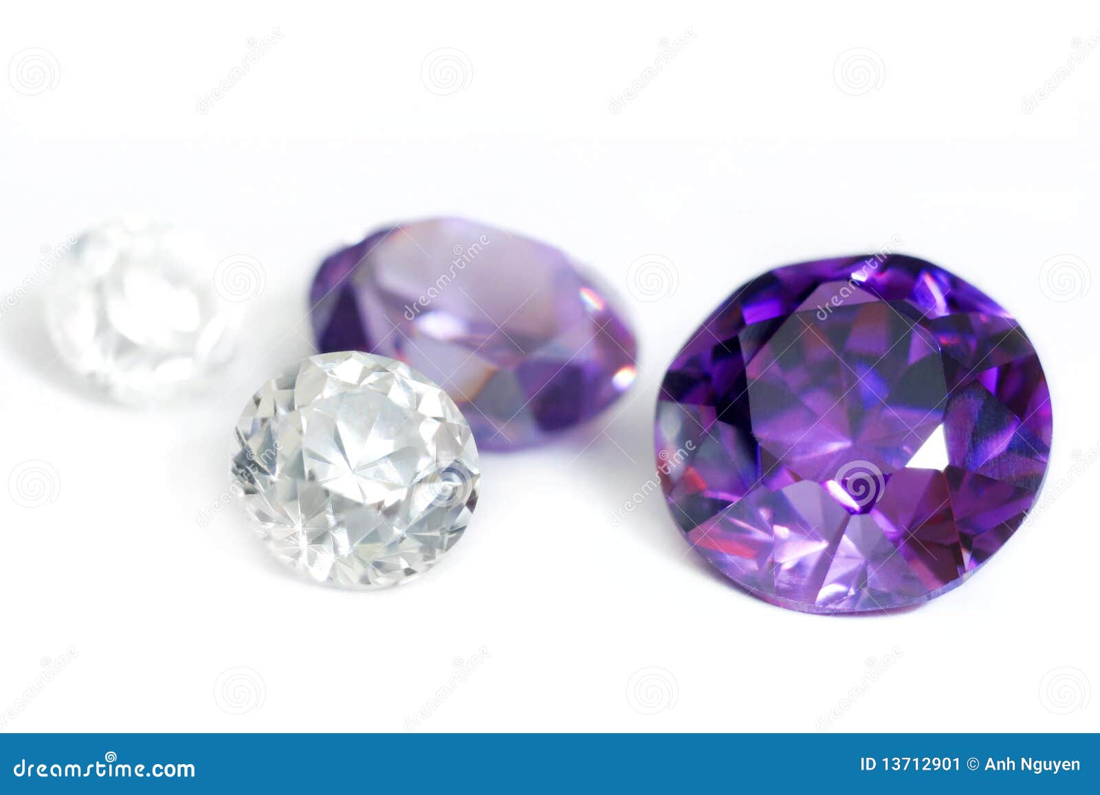 purple and colorless gemstones close-up