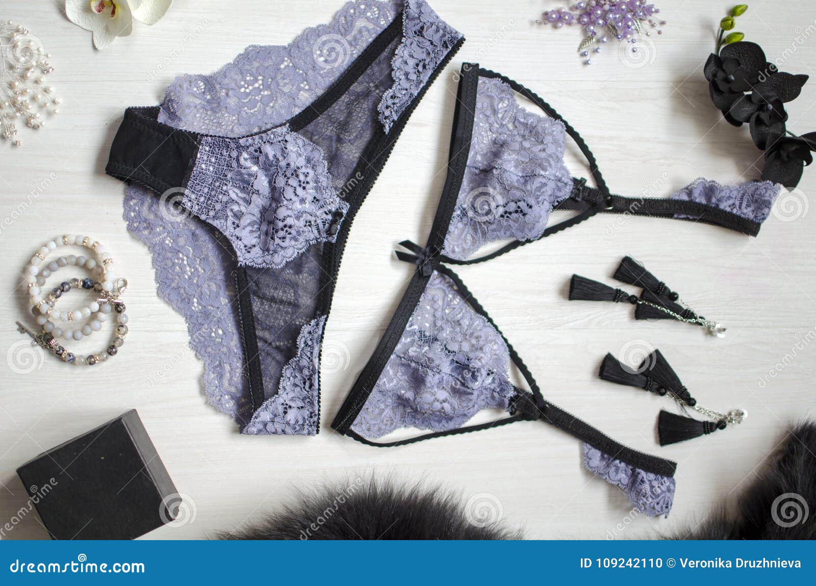 Purple Lace Lingerie Set on the White Wooden Background. Violet Stock Photo  - Image of female, accessories: 109242110