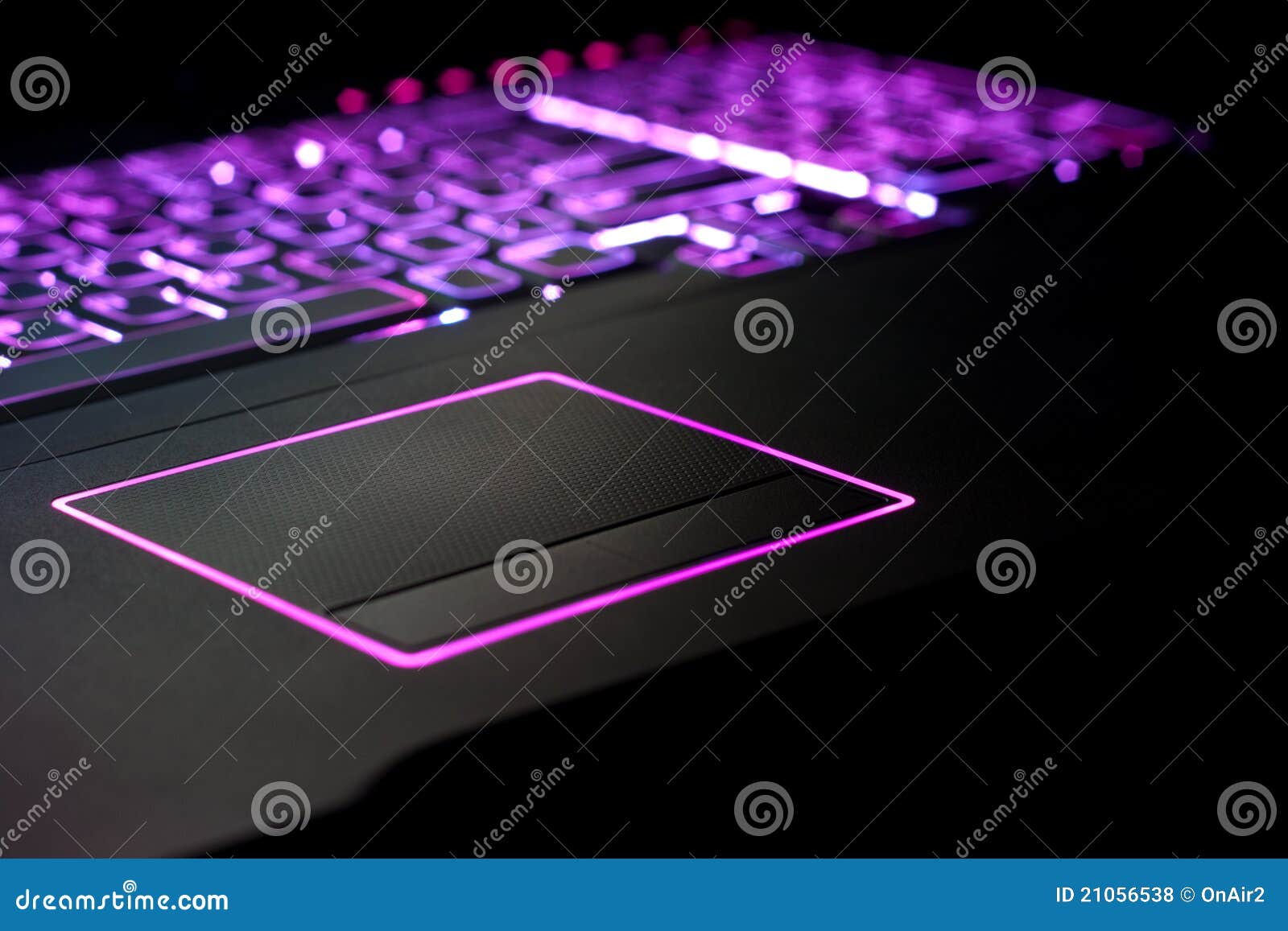 purple laptop focus on touchpad