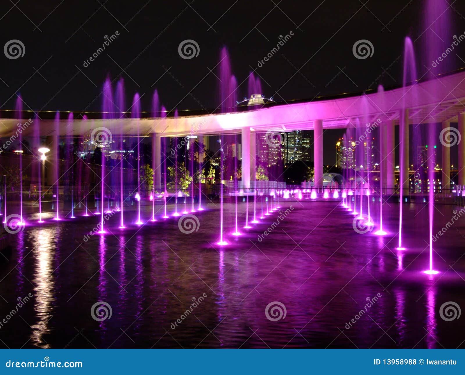 Purple Lighted Water Fountain At Marina Barrage Royalty Free Stock