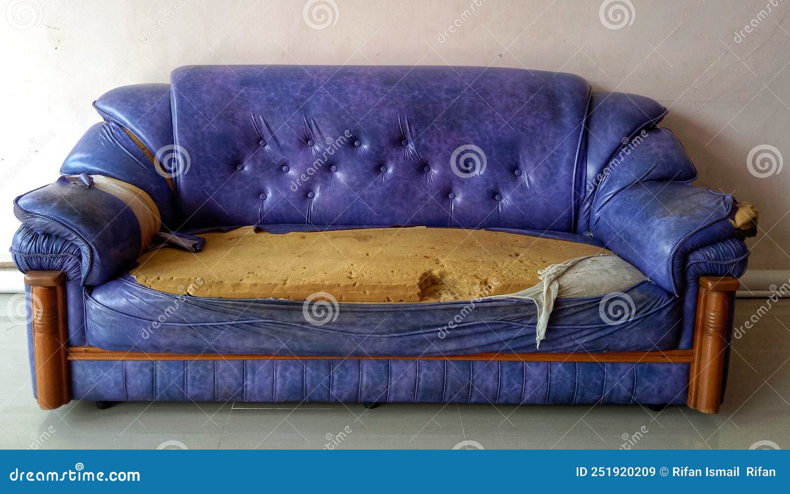 The Purple Sofa is Broken, the Sofa Cloth is Torn Stock Image Image