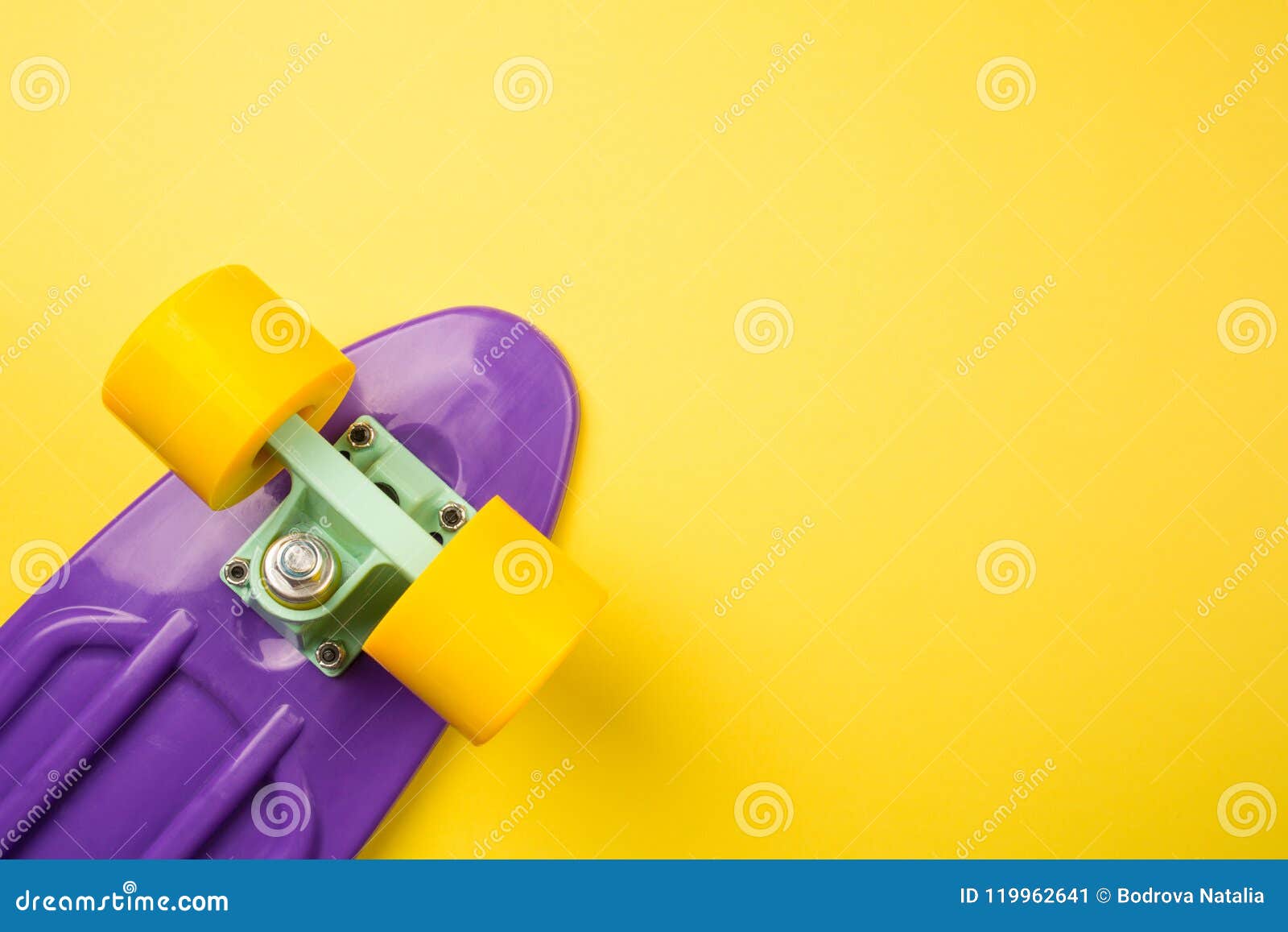 Purple Youth Skateboard on Yellow Background. Children`s Plastic Mini ...