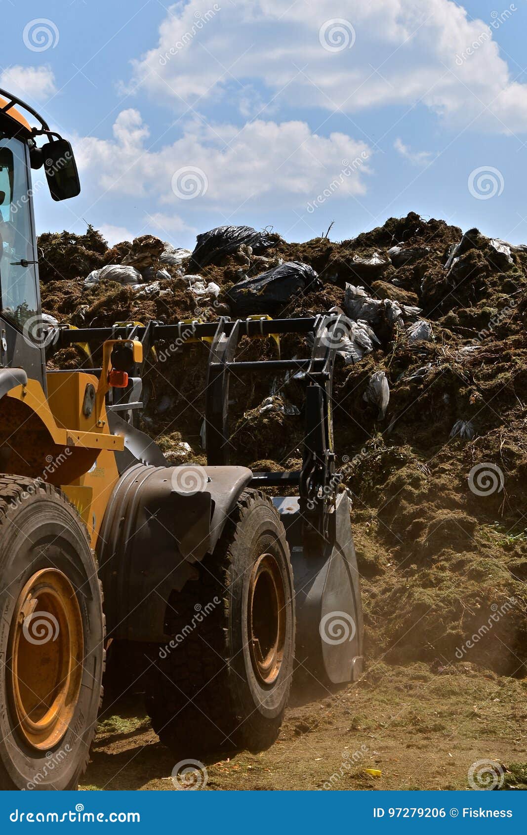 Pushing Grass Trimmings into a Compost Stock Photo Image of garden