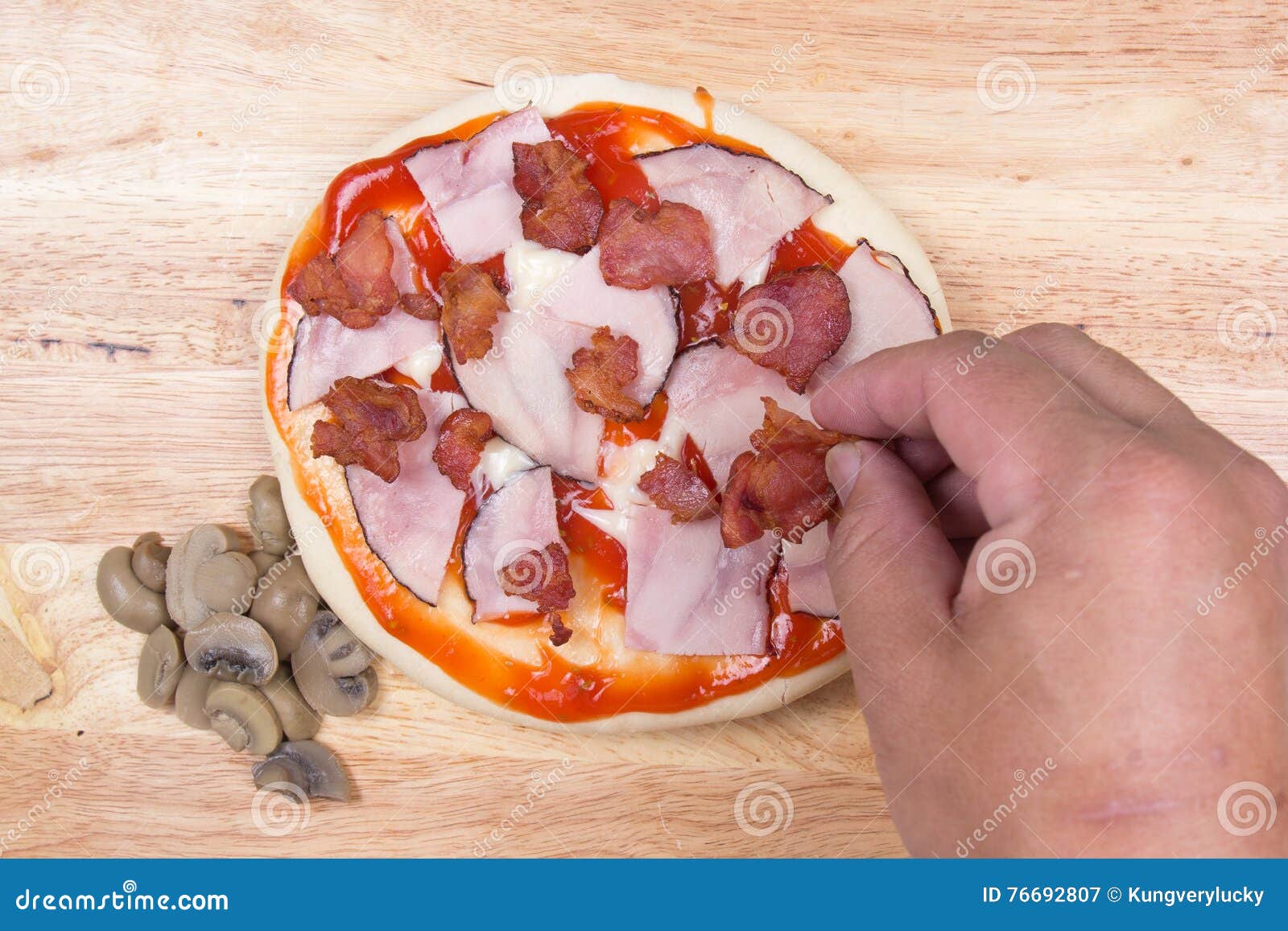 Putting Bacon Pizza Crust Stock Photos - Free & Royalty-Free Stock