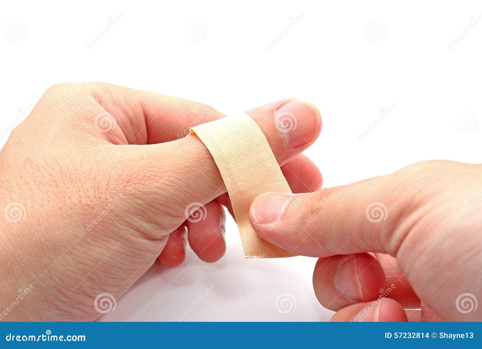 Putting bandage on thumb stock photo. Image of protection 57232814