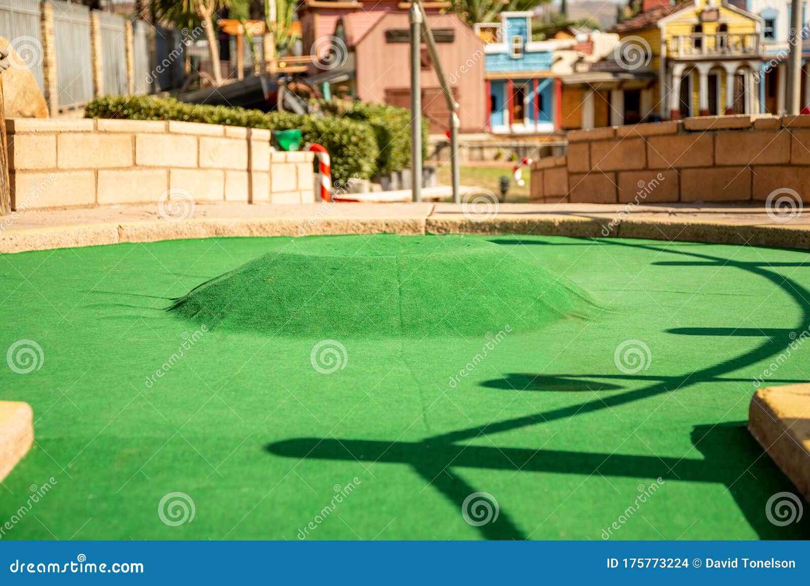 Putting green and hole editorial stock image. Image of club - 175773224