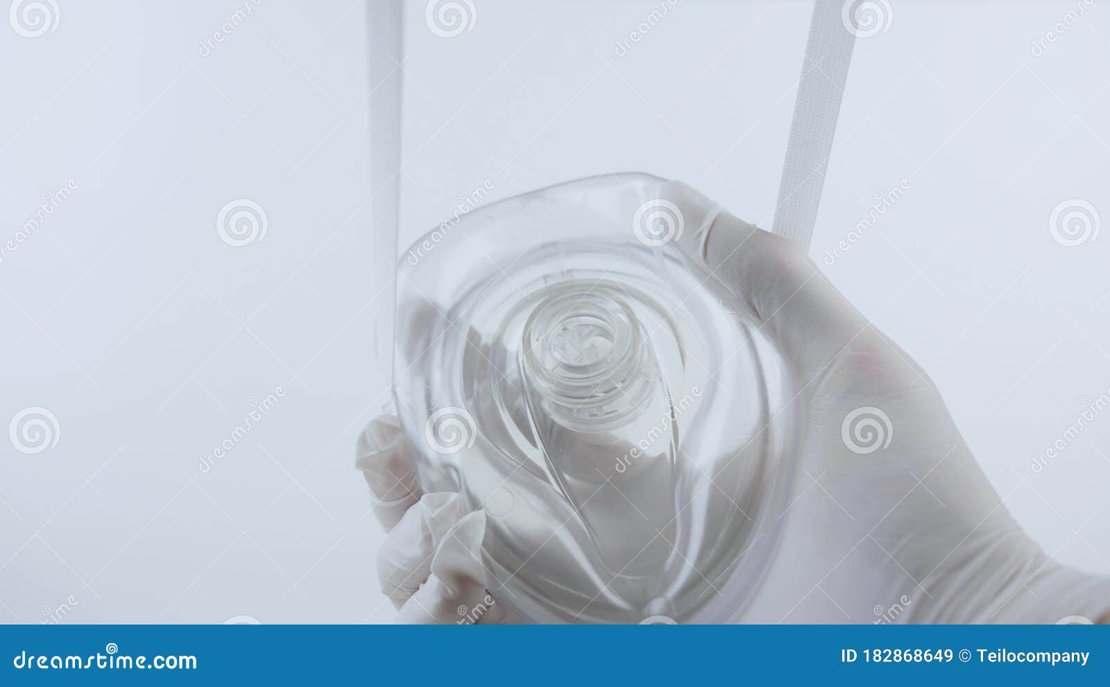 Putting on Oxygen Mask. White Surgical Gloves in Sterile Environment