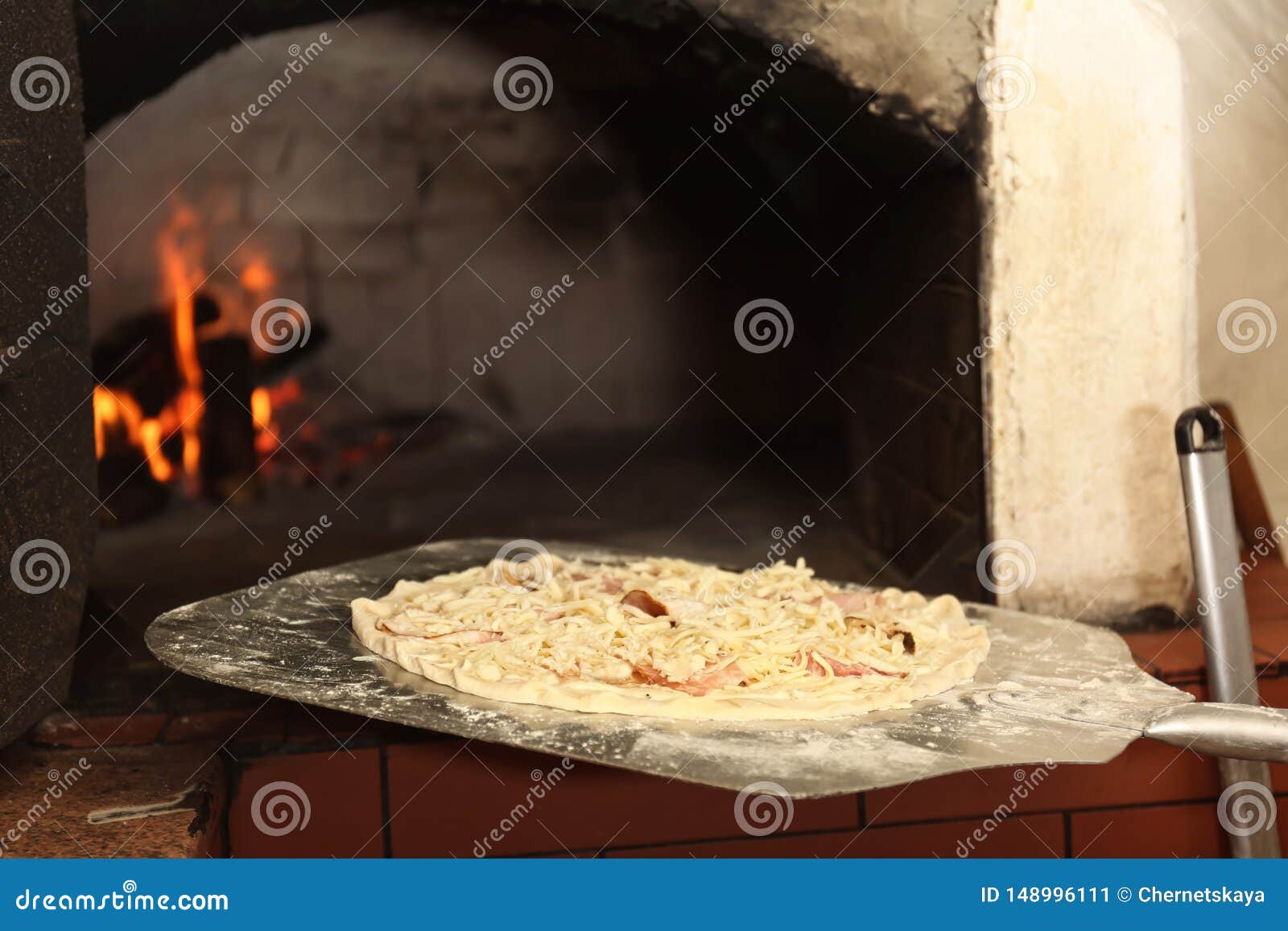 Putting Pizza into Oven in Kitchen Stock Image Image of cook, culture