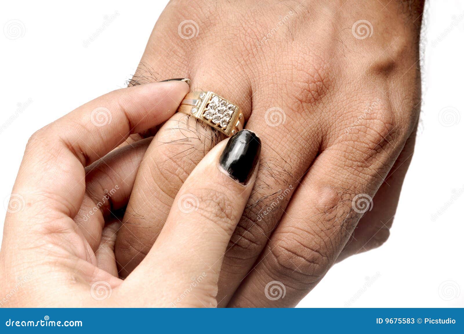 Putting wedding ring stock image. Image of male, macro 9675583