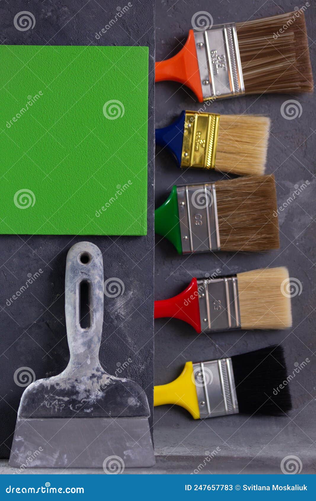 Putty Knife Tool on Cement Background. Construction Tools on Concrete