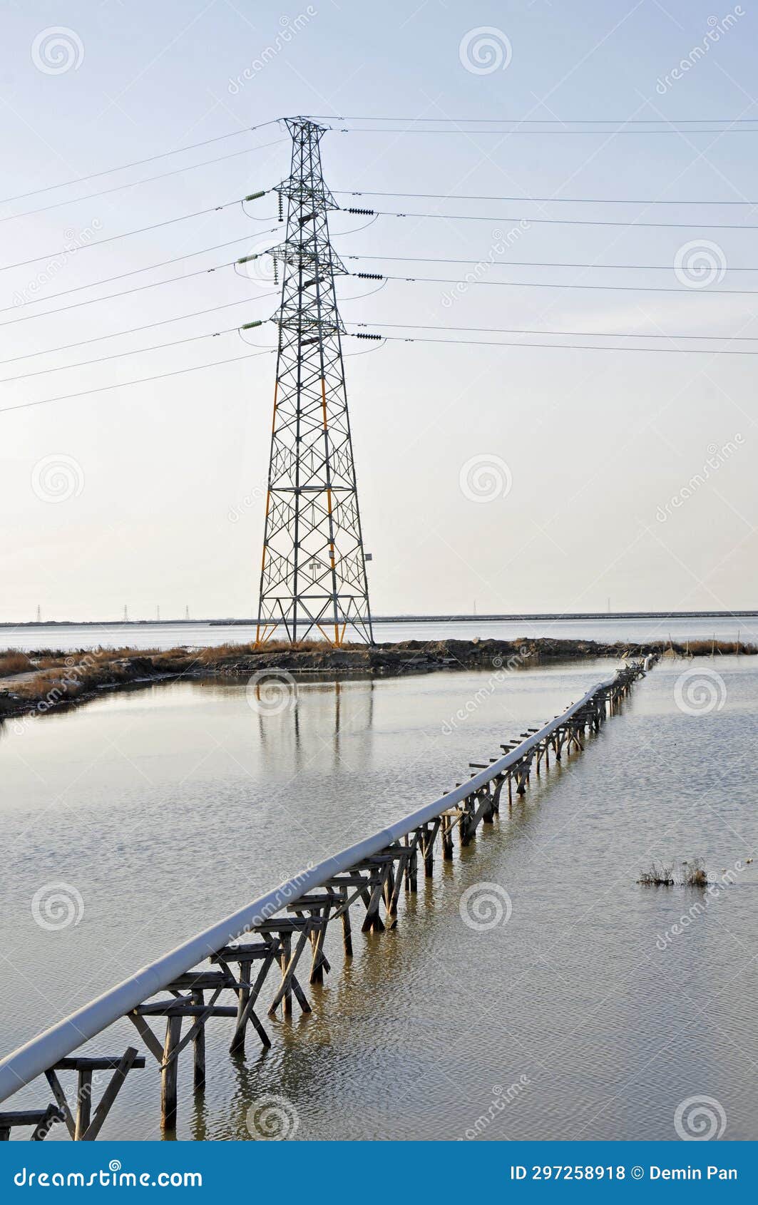 Pylon and Simple Reflection in the Water Pipe Equipment Stock Photo