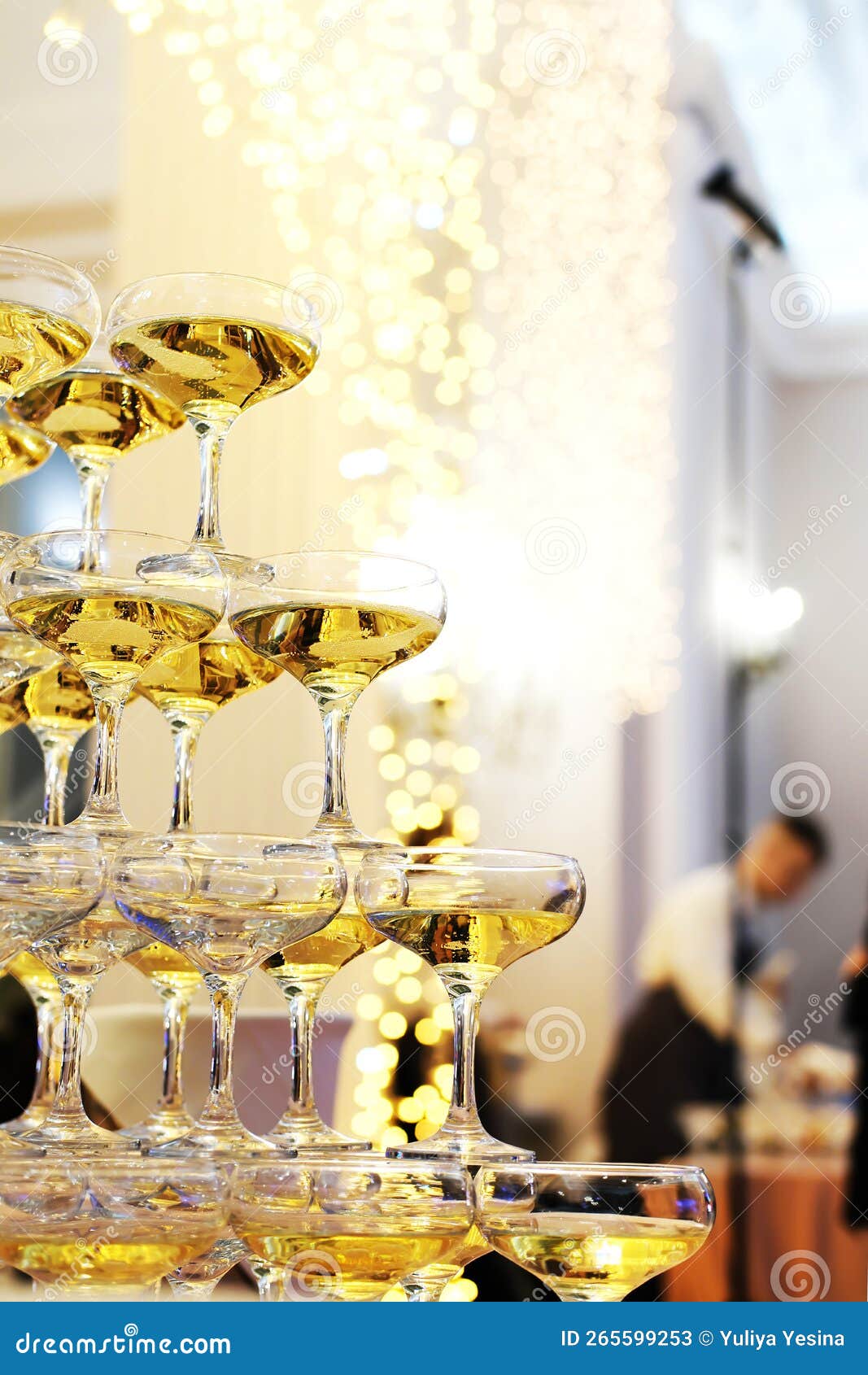 Pyramid of Champagne Glasses at a Party. Champagne Pyramid Stock Image