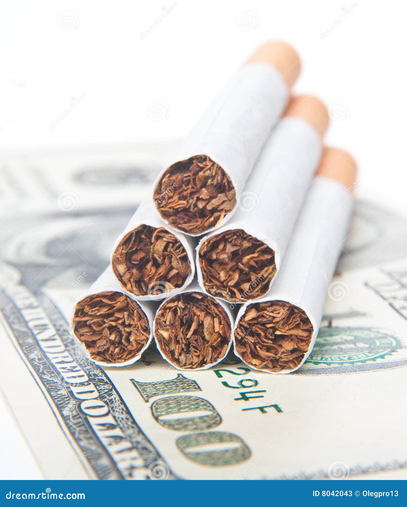 Pyramid of Cigarettes Laying on Money Stock Image Image of fire, line