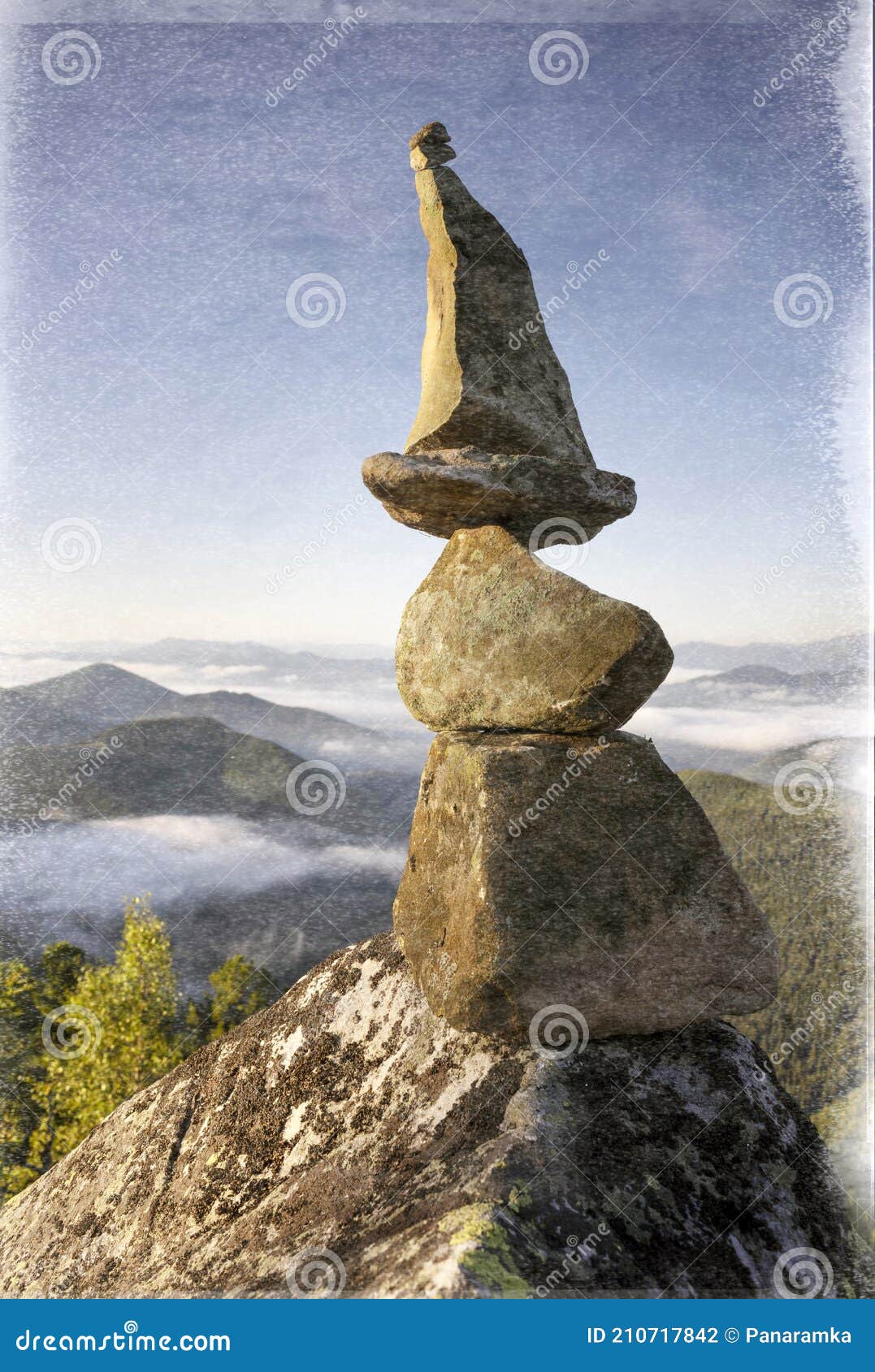 pyramid of stones at the top is a landart