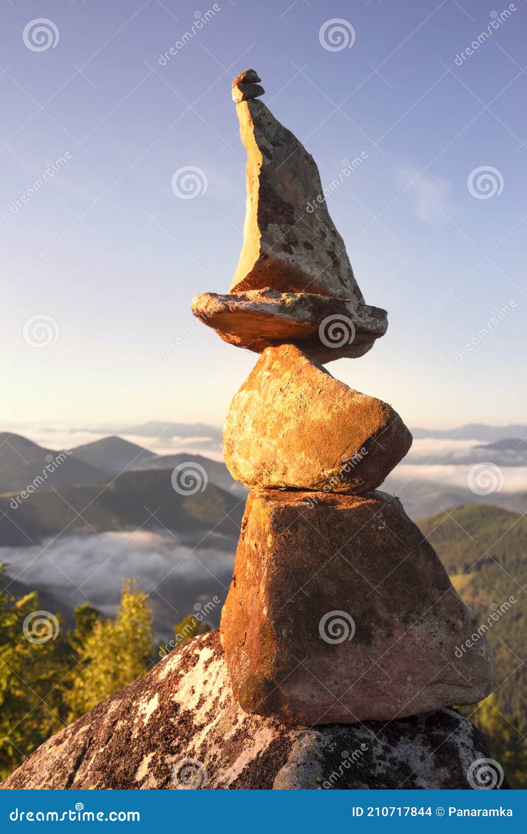 pyramid of stones at the top is a landart