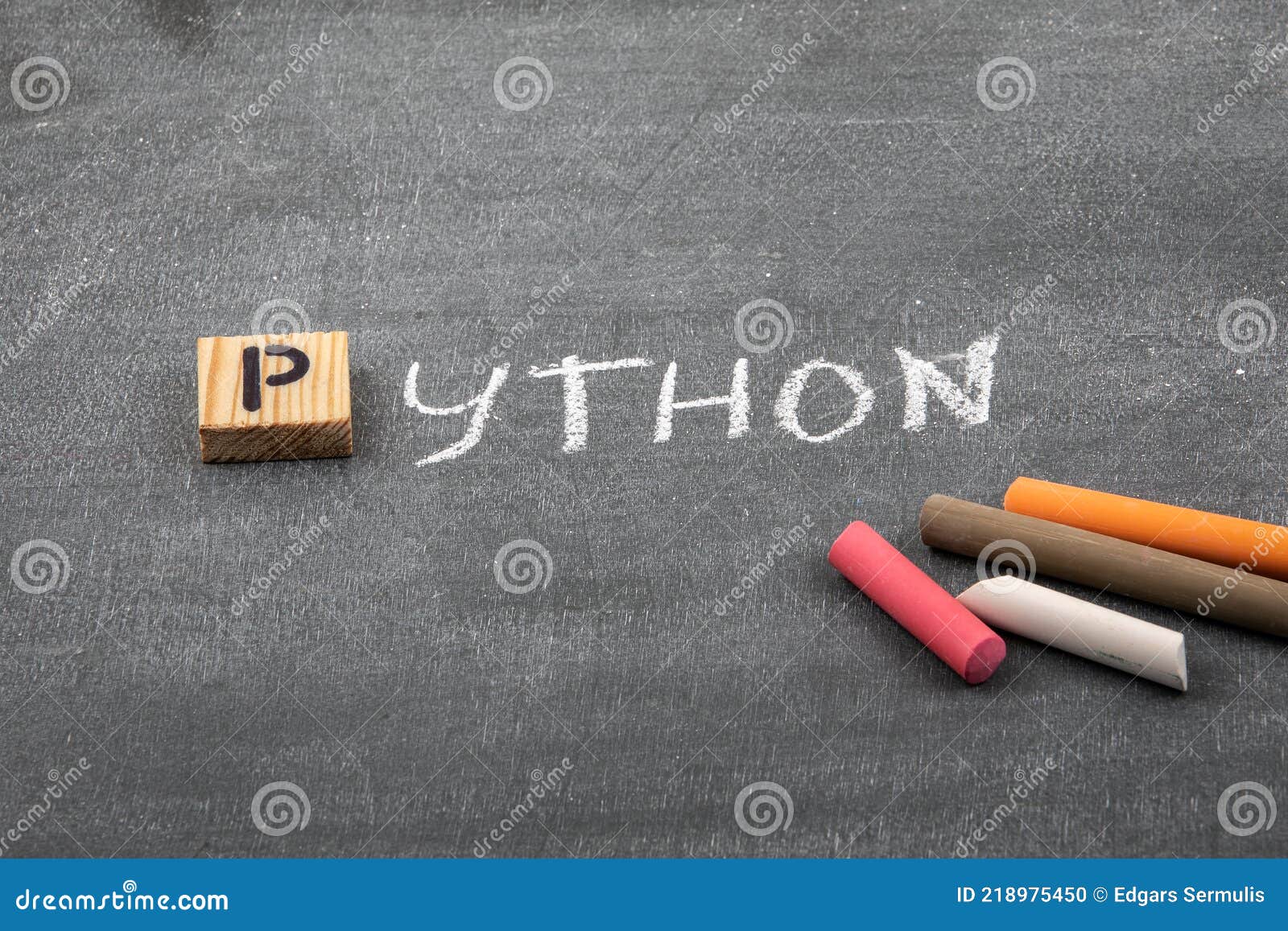 Python Code and Programming Language Concept. Colored Chalk Pieces on a