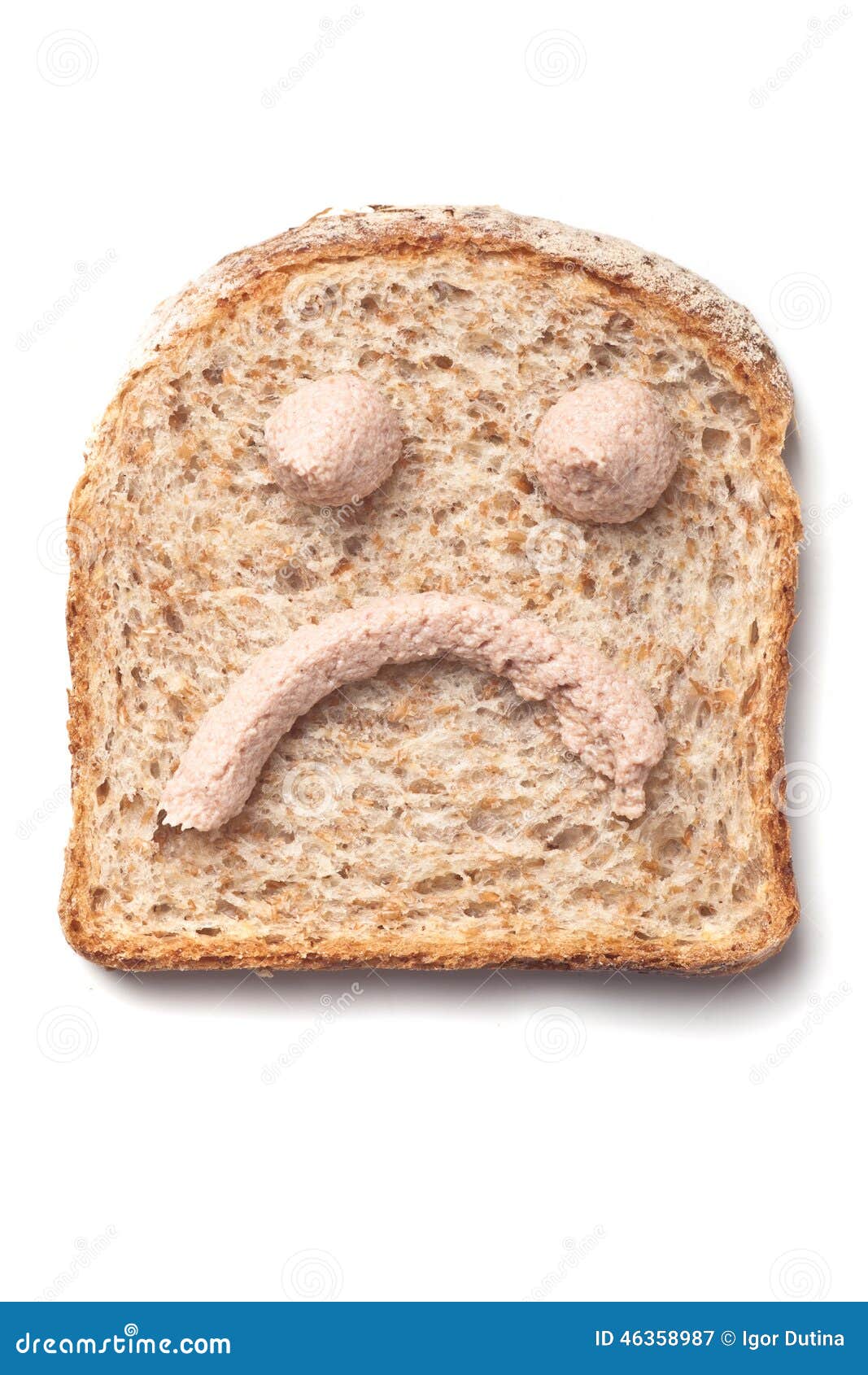 pÃÂ¢tÃÂ© spread smiley on slice of bread