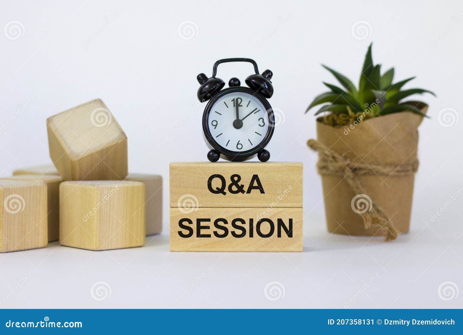 q and a, questions and answers session . concept words `q and a session` on wooden blocks on a beautiful white background.
