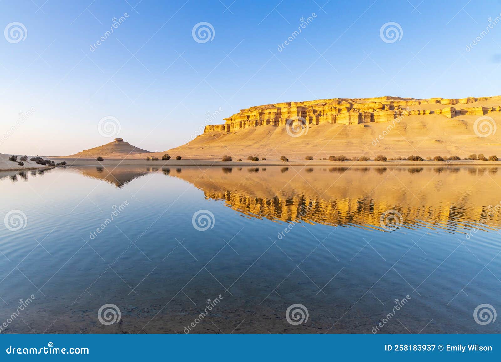 reflections in qarun lake in the desert at faiyum oasis