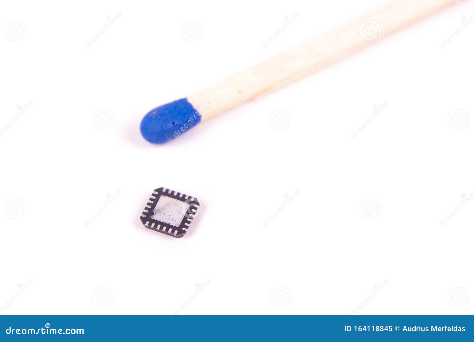 qfn case electronics component in comparison with match head