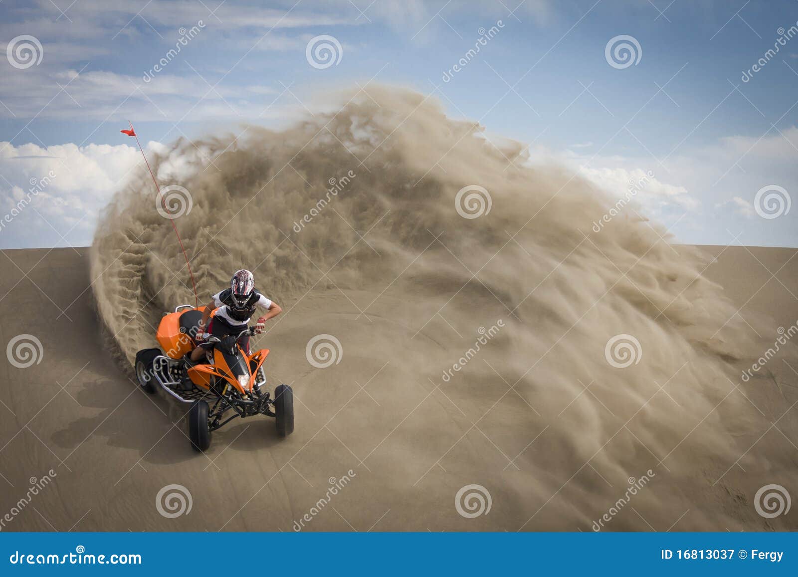 quad rider in sand dunes roost