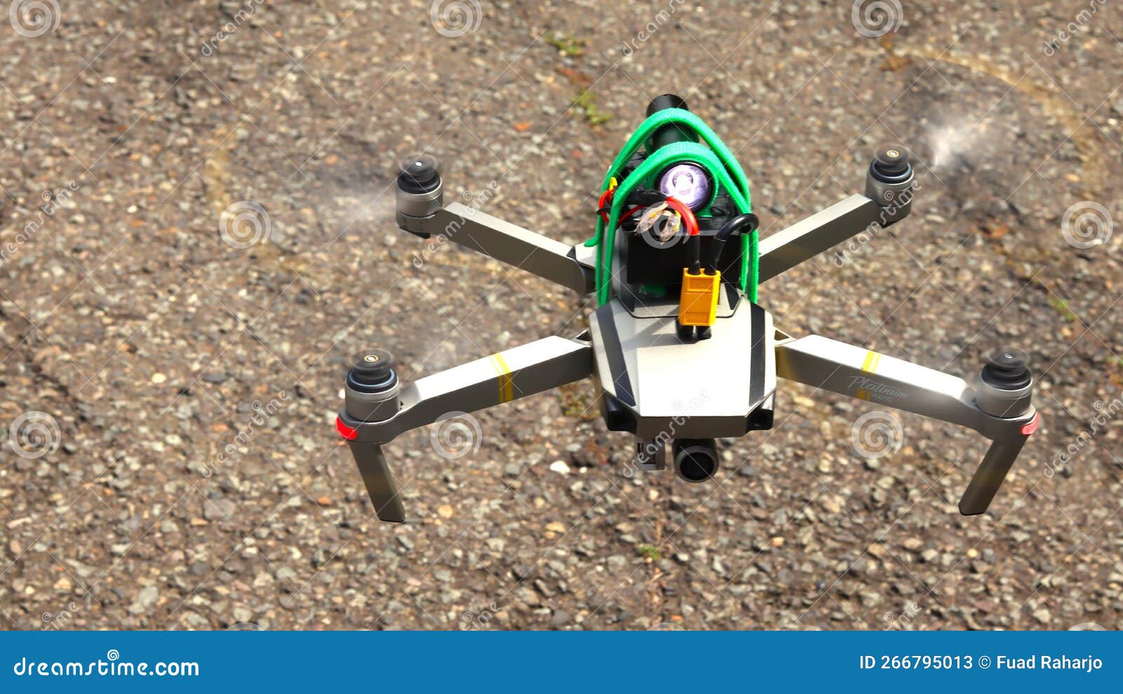 quadcoper with extra battery is flying