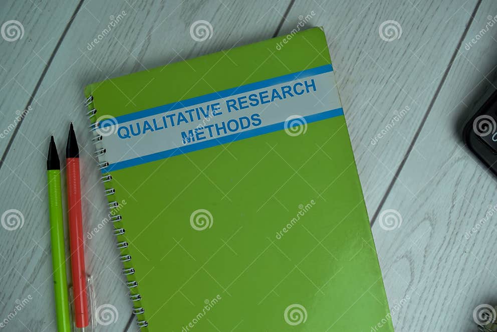 Qualitative Research Methods Write on a Book Isolated on Office Desk