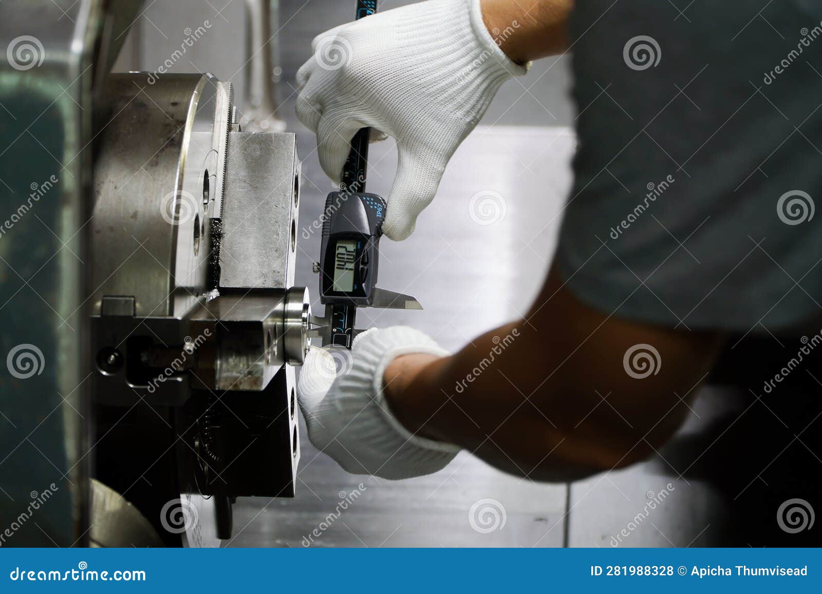 Quality Control Manufacturing.Hands of an Engineer Measures a Metal