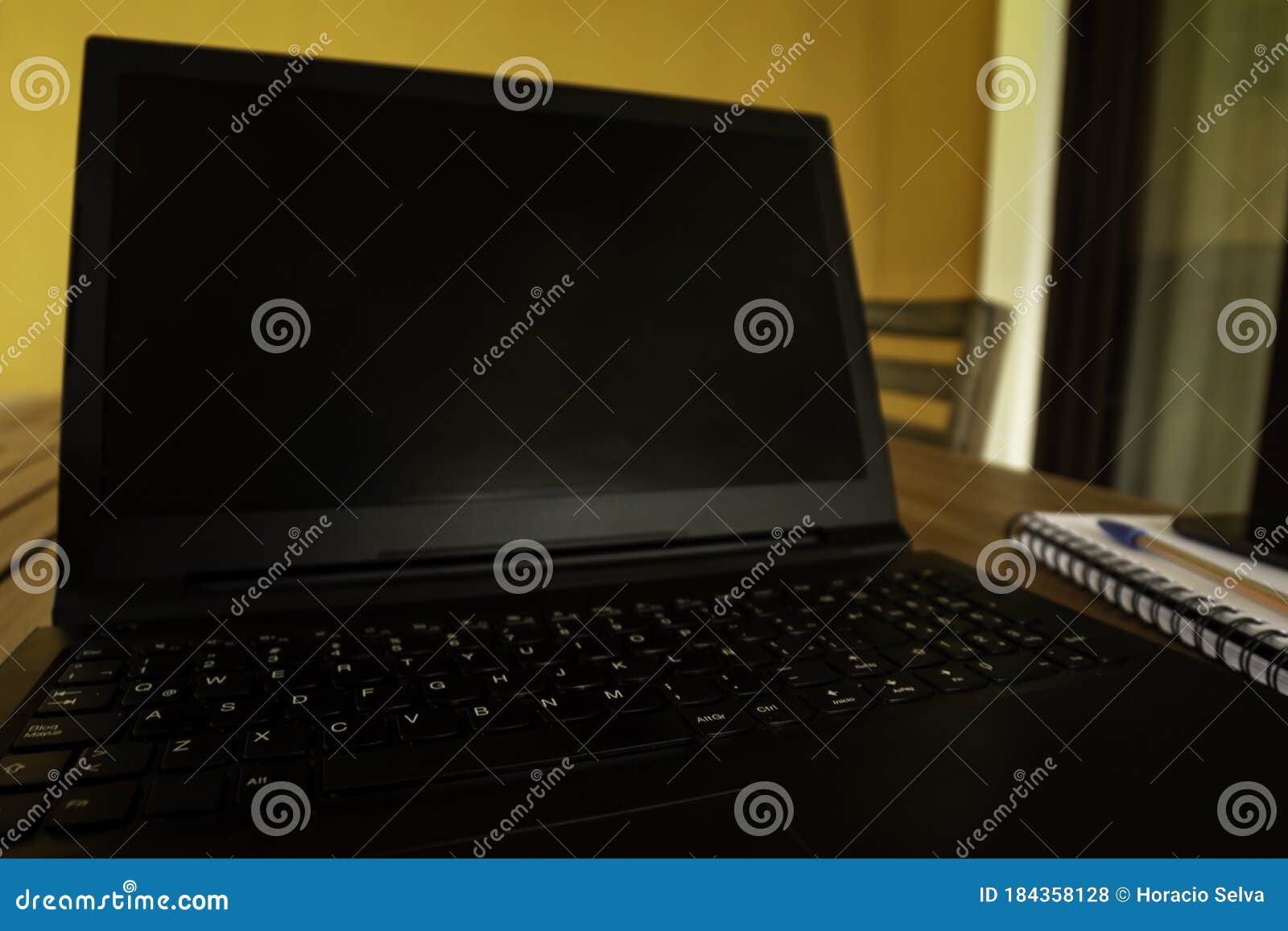 Quarantine Home Office Concept. Laptop on a Table To Work from Home