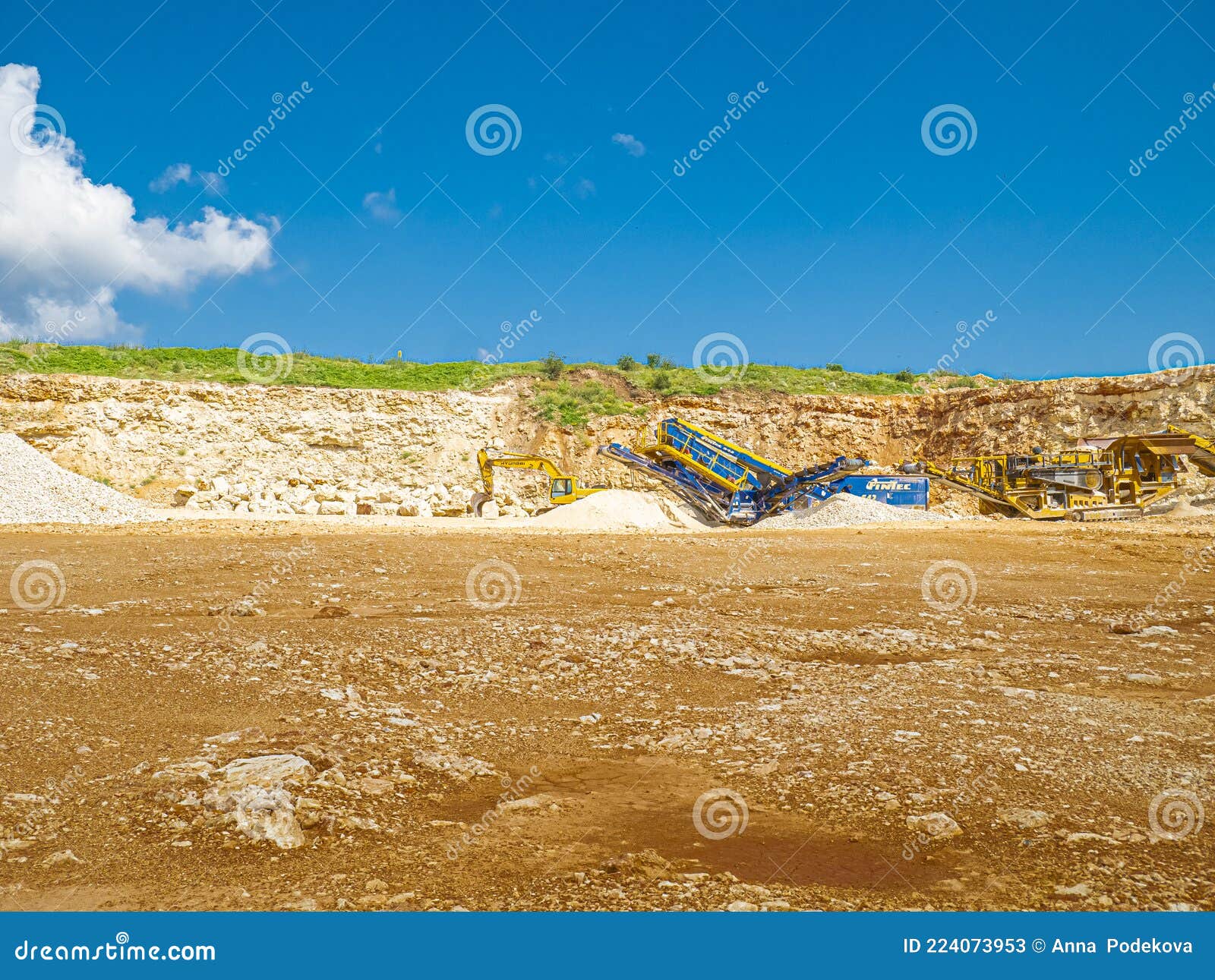 limestone stone quary and an excavator.
