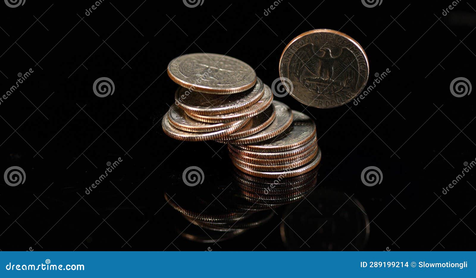 Quarter Dollar Coins Falling, Rolling and Sliding on Black Background