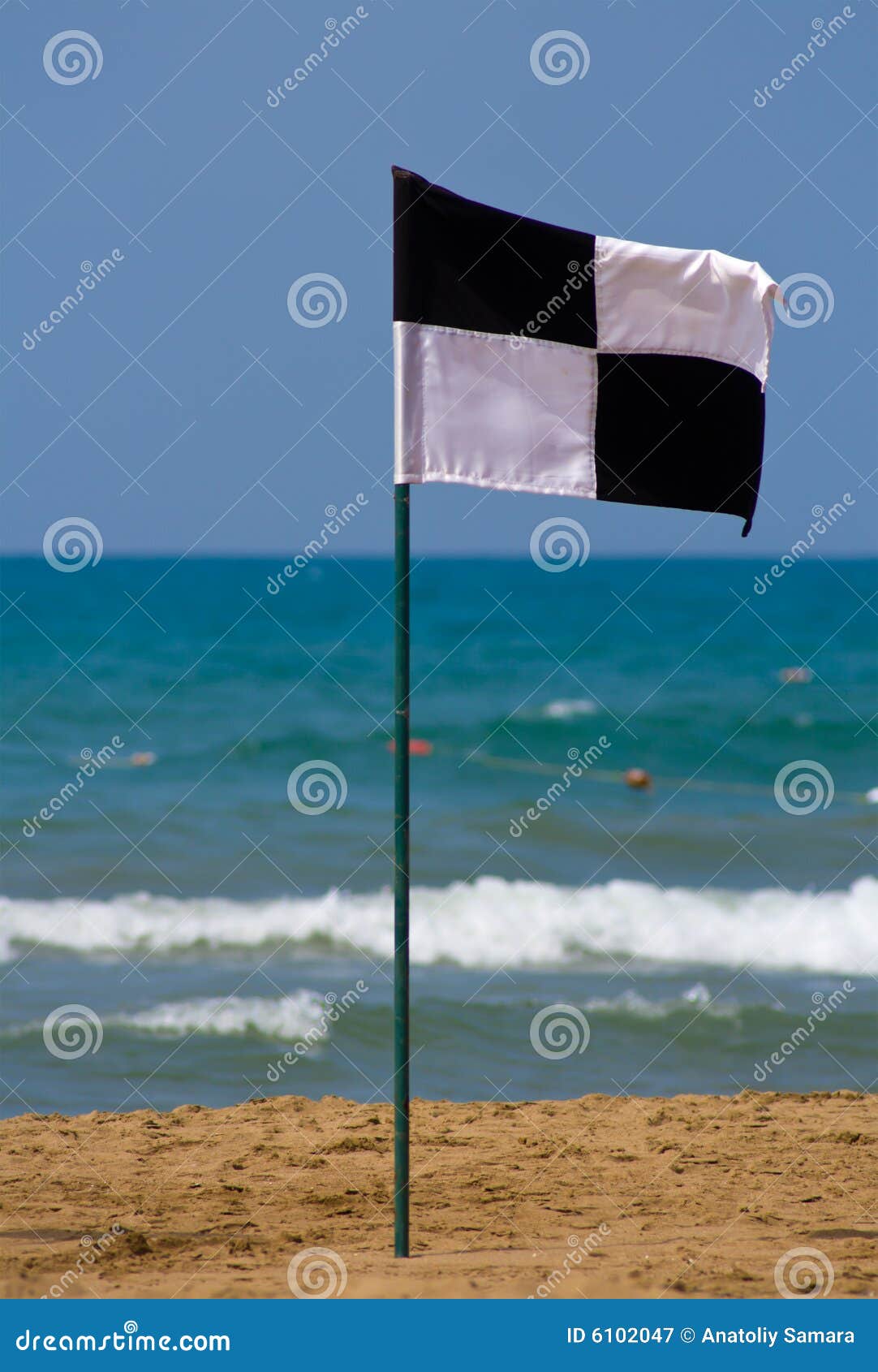 Quartered Black and White Flag on the Beach Stock Image Image of