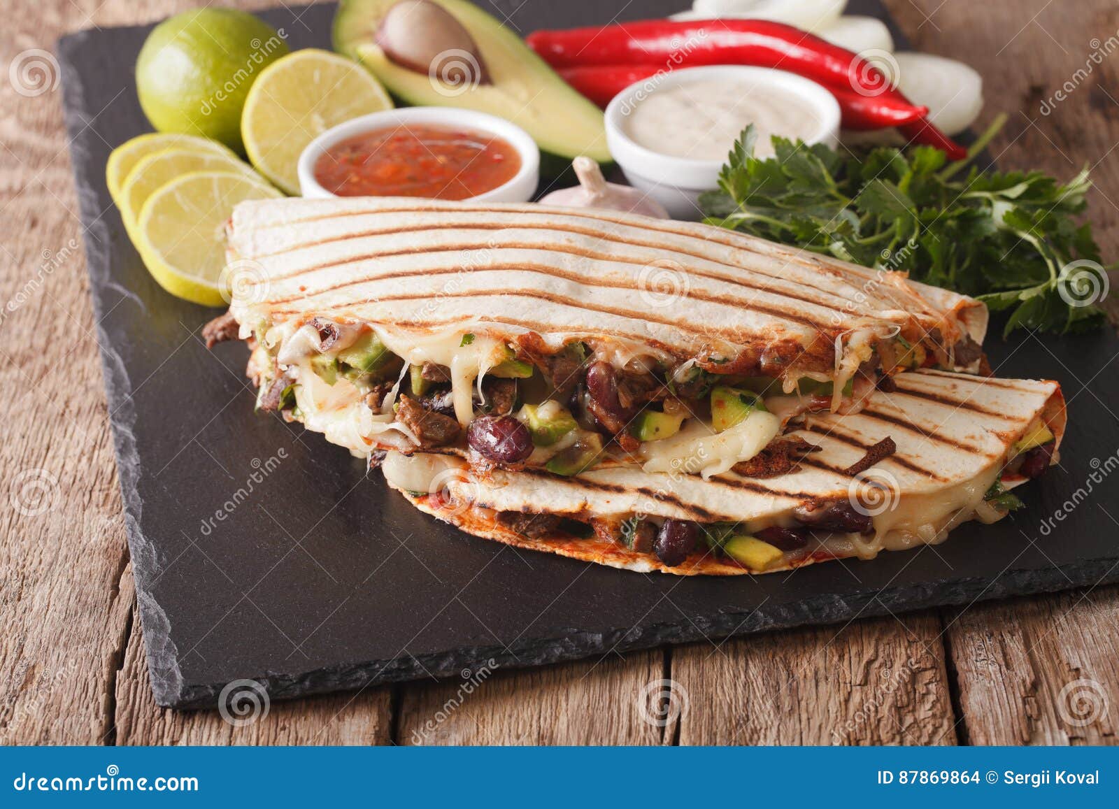 Quesadilla with Minced Beef, Beans, Avocado and Cheese Closeup