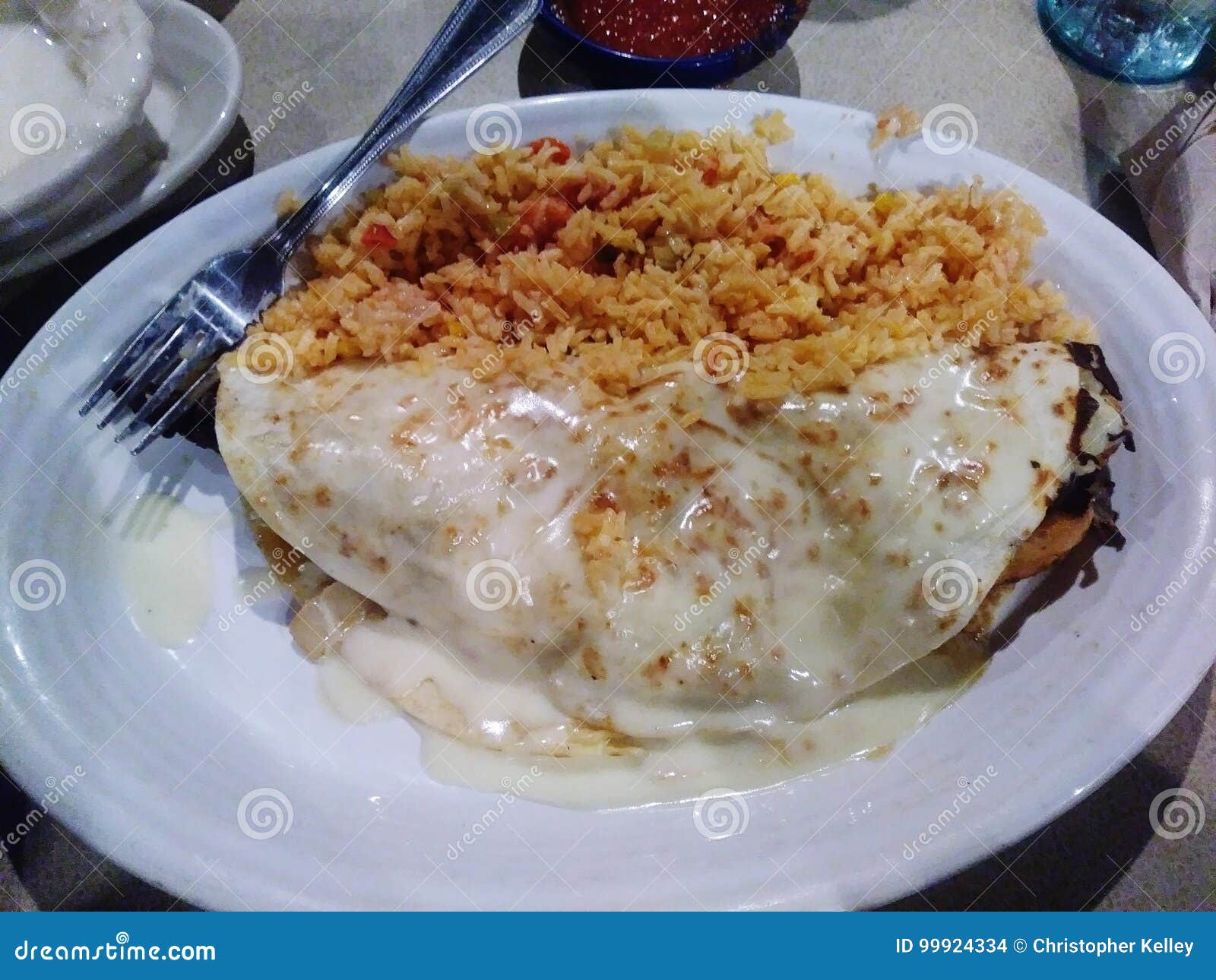 Queso Smothered Quesadilla and Spanish Rice Stock Photo Image of