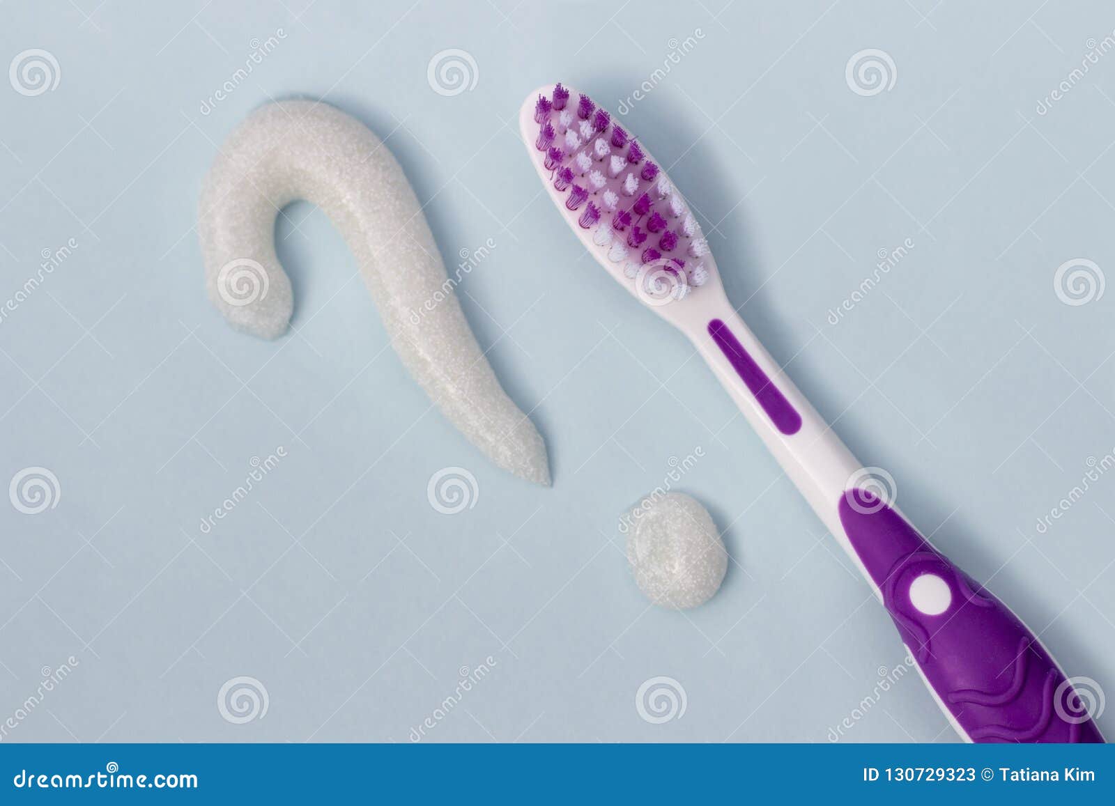 Question Mark from Toothpaste and Toothbrush on Blue Background, Toothpaste Selection Concept
