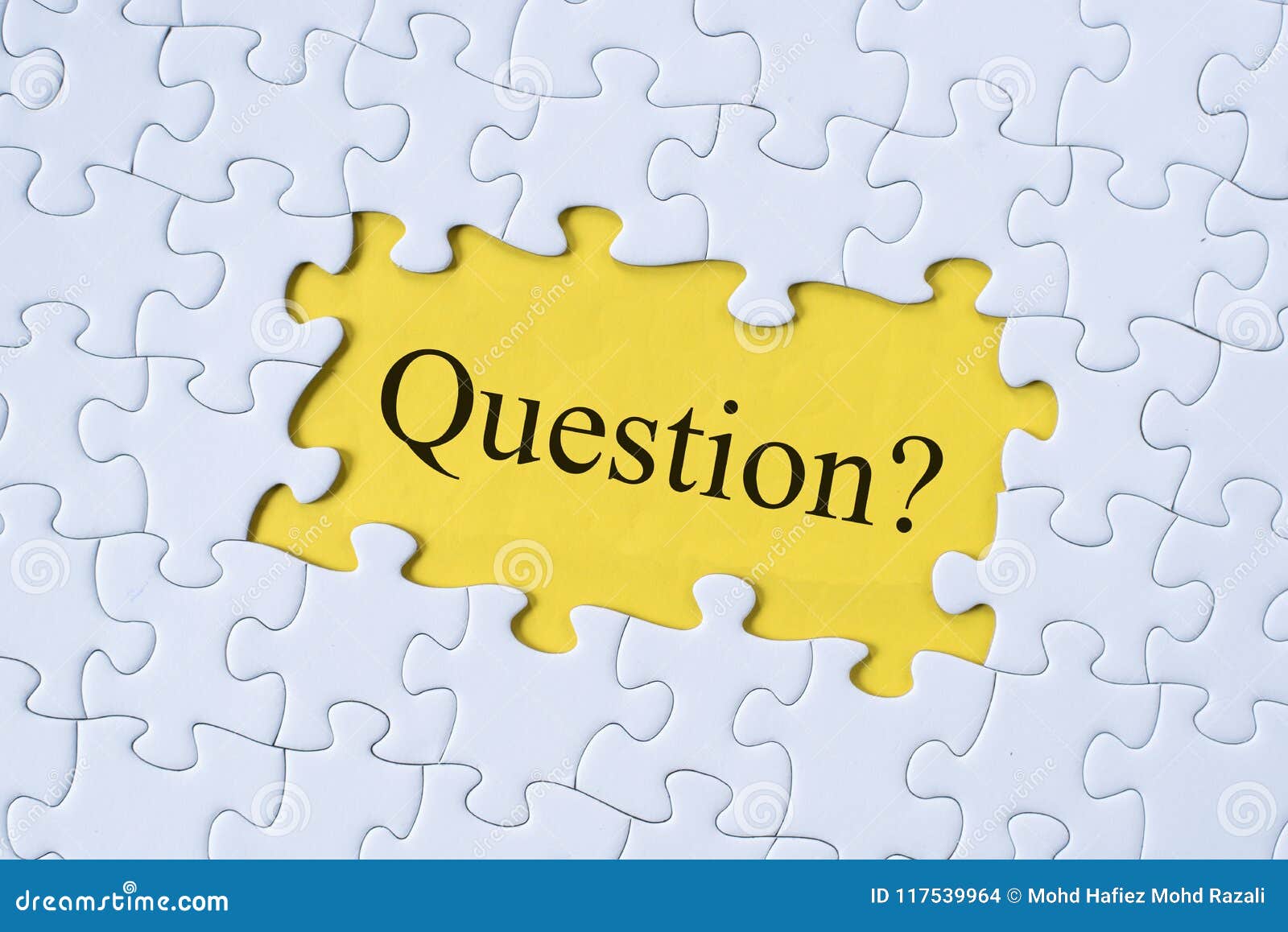 Question Word on Jigsaw Puzzle with Yellow Background Stock Photo ...