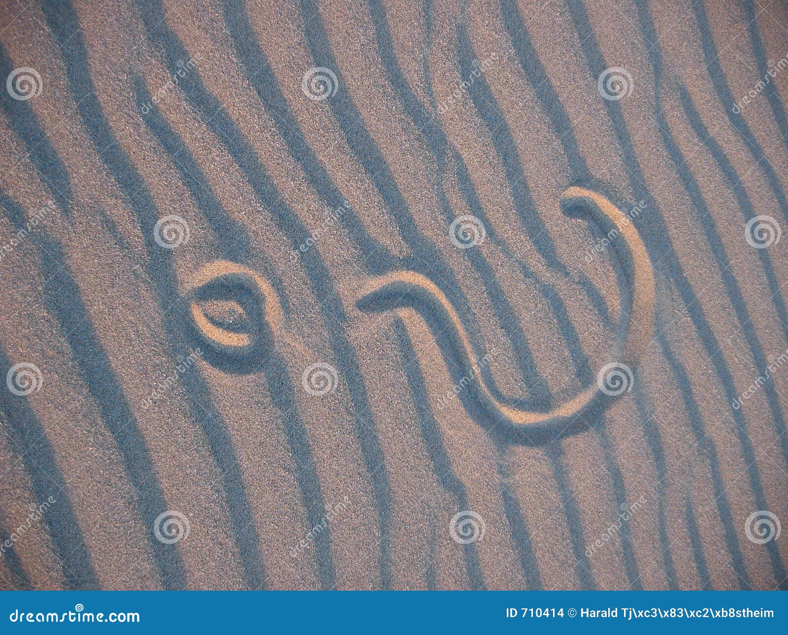 questionmark in sand