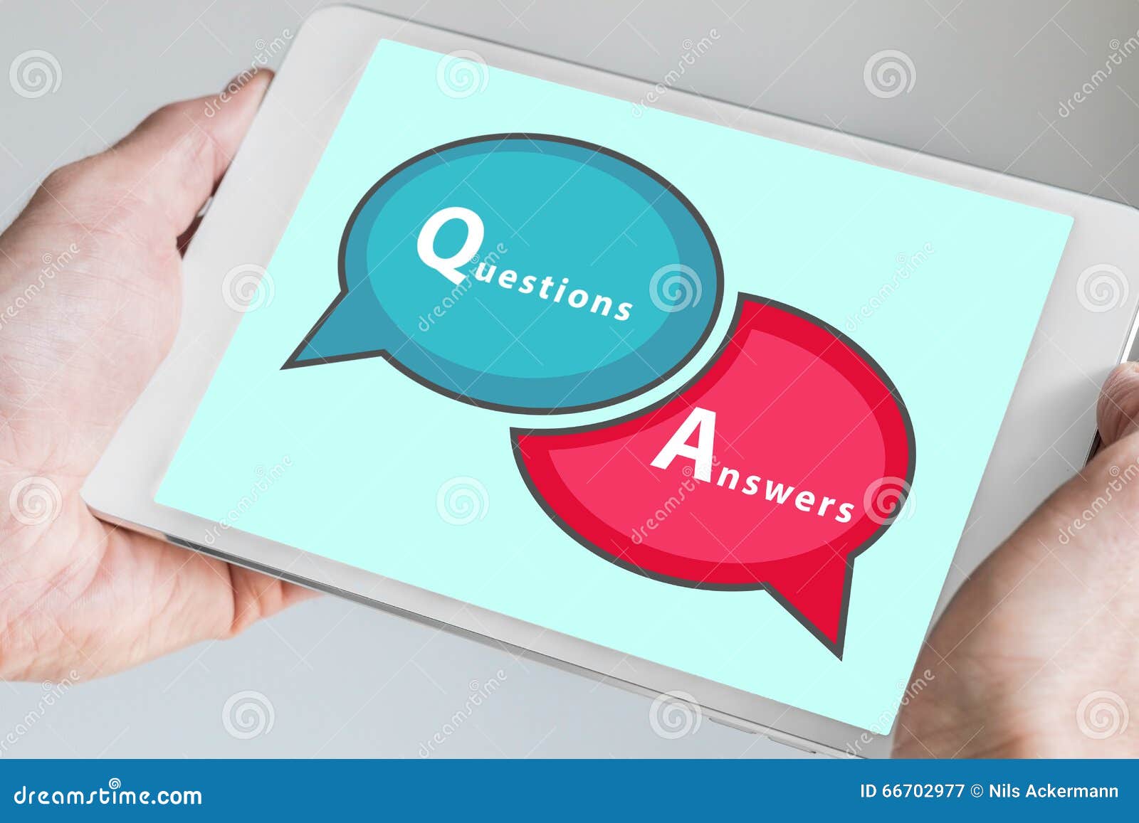 questions and answers q&a session concept with hands holding modern tablet or smartphone to be used as slide background