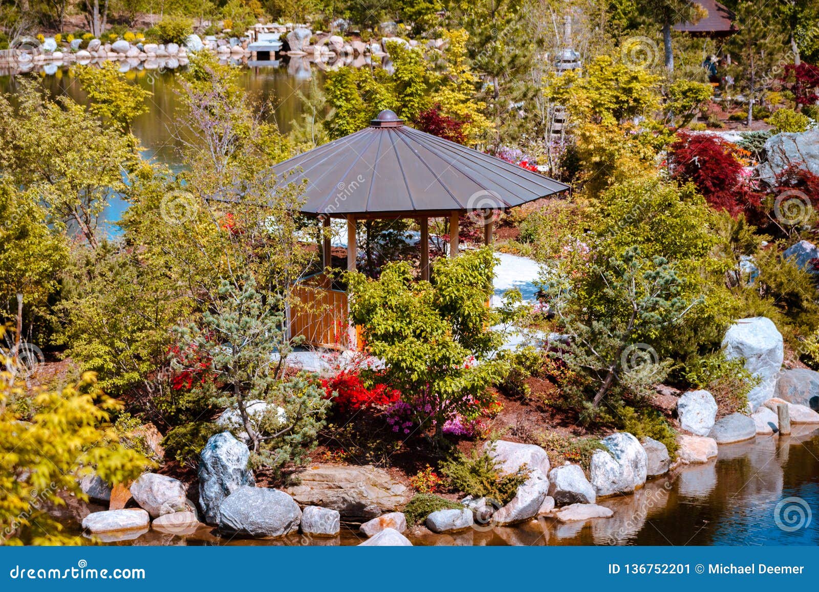 Quiet Gazebo Set In The Middle Of A Blooming Japanese Garden At
