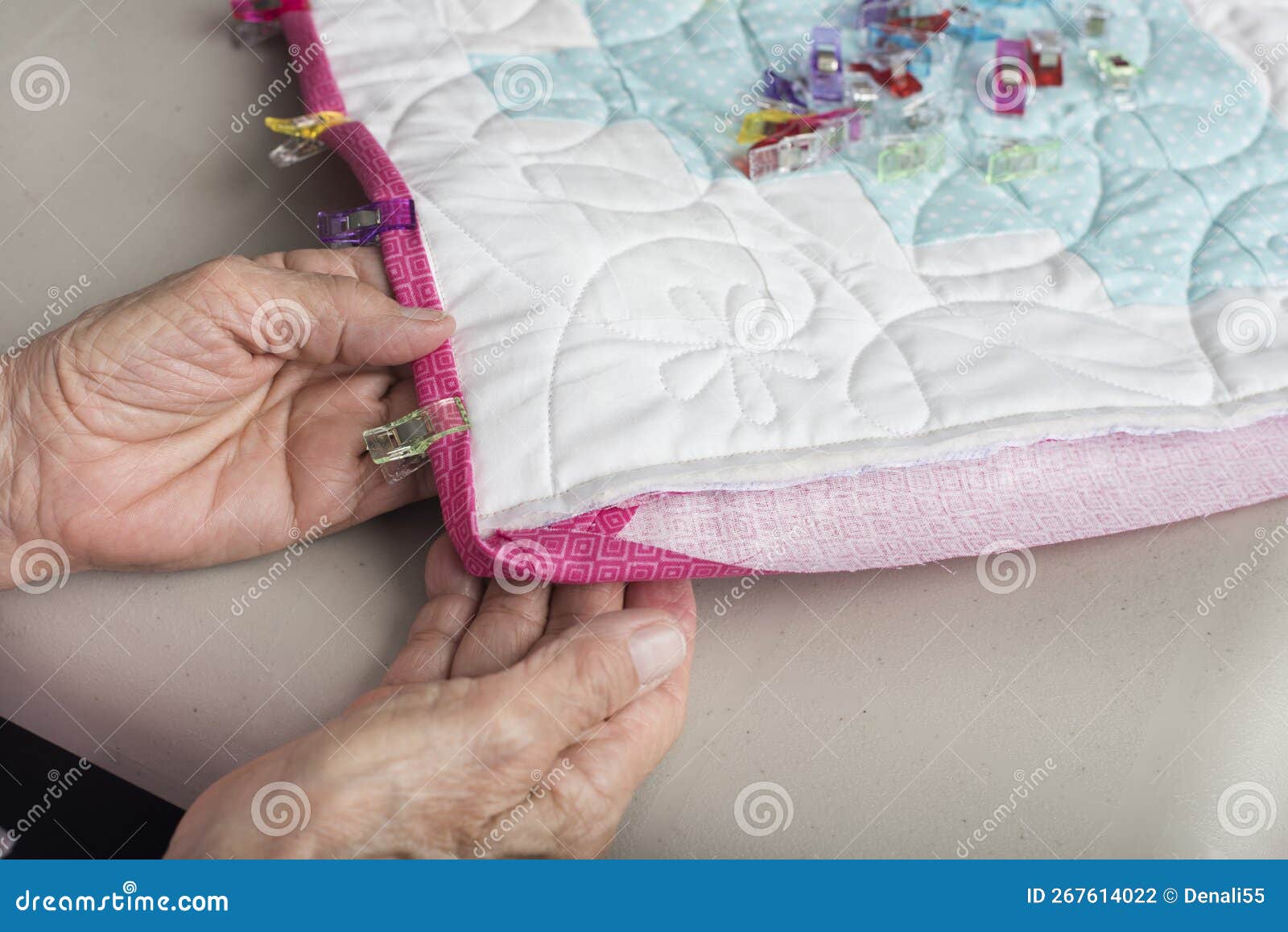 adding plastic edge clips to a quilt