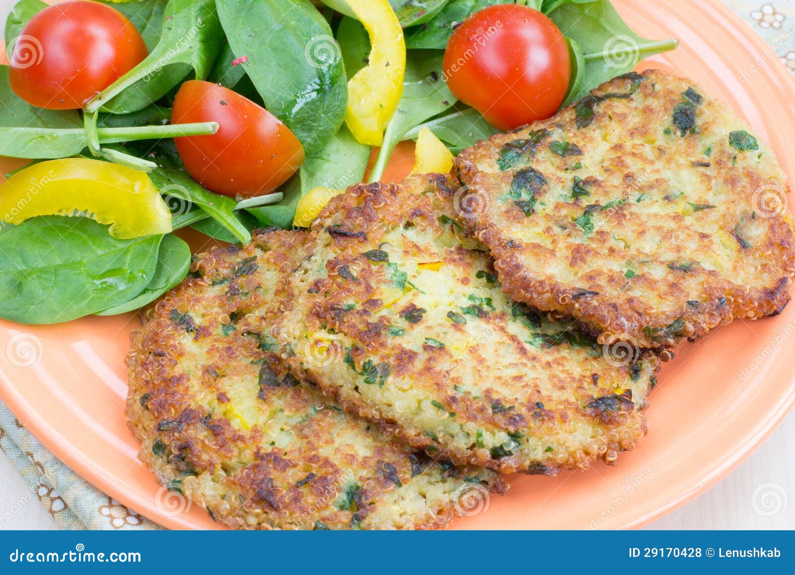 Quinoa fritters with salad stock photo. Image of indoors 29170428