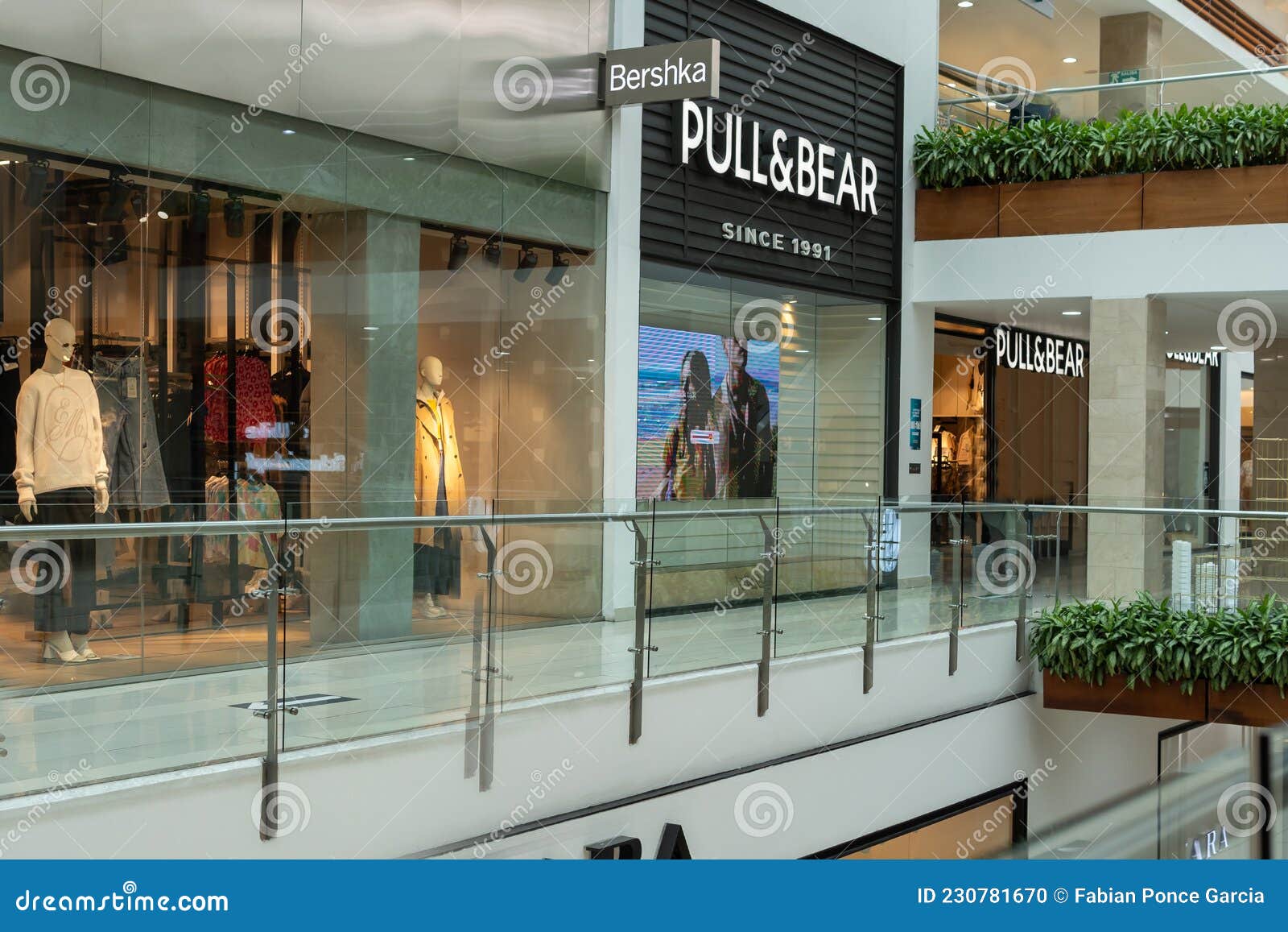Quito, Pichincha, Ecuador, September 11, 2021. Showcase and Sign with Bershka and Pull & Bear Logo in Quicentro Center Editorial Image - Image boutique, 230781670