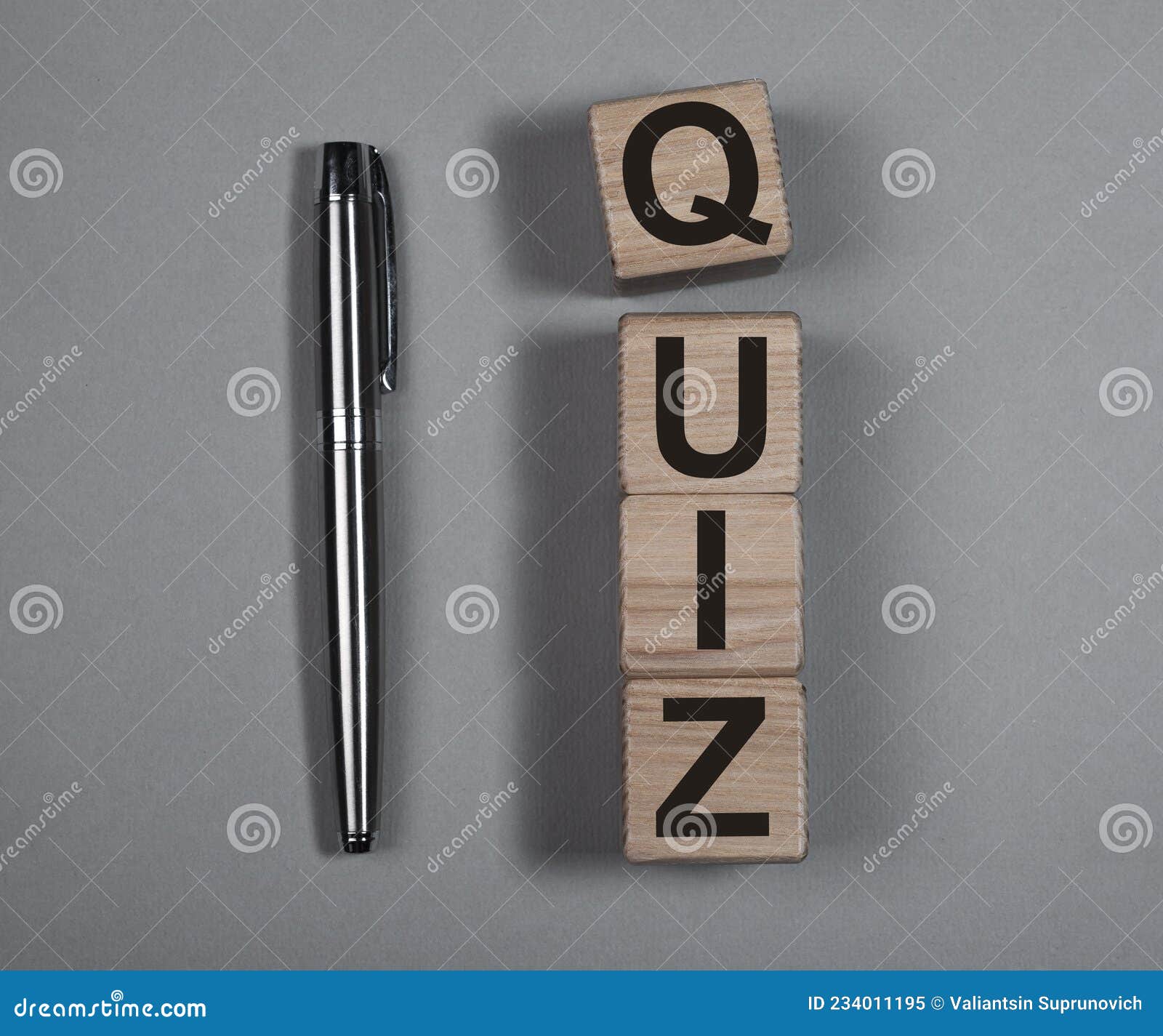 quiz or quizz concept. word on wood cubes on gray background