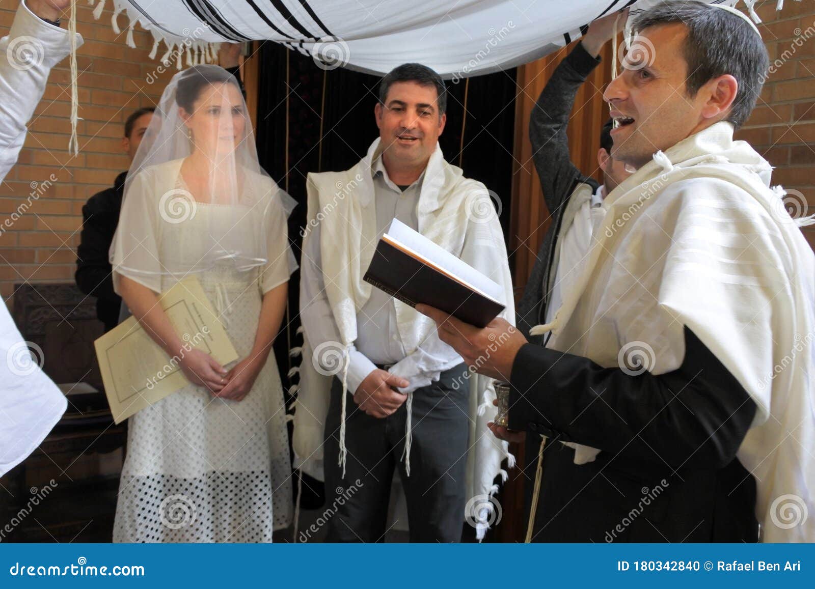 Rabbi Blessing Jewish Bride And A Bridegroom In Jewish
