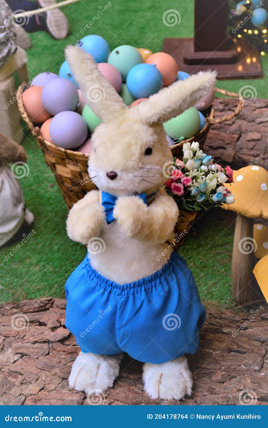 a rabbit in blue shorts in christmas decoration