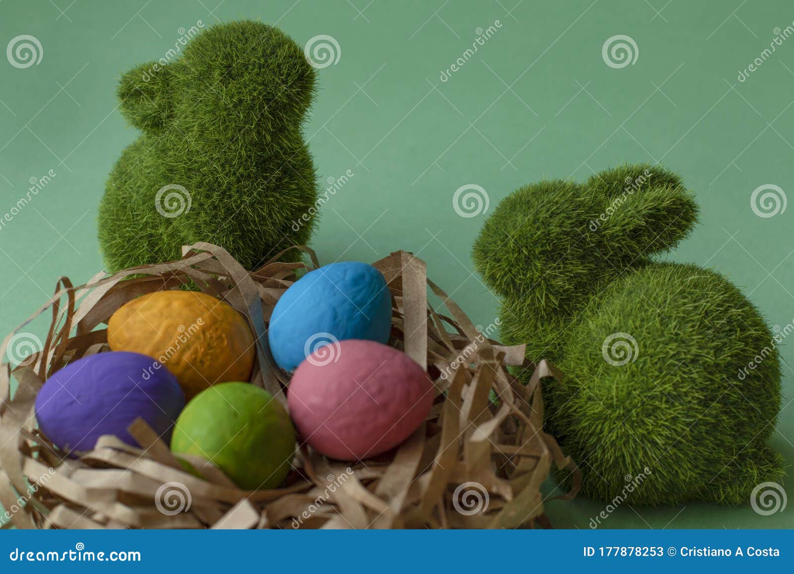 couple of rabbits and easter eggs