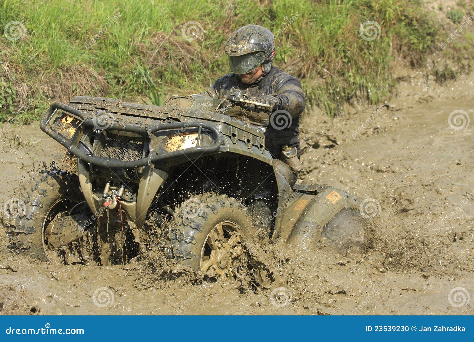 Race Fourwheeler Driver in Puddle of Mud Editorial Image Image of