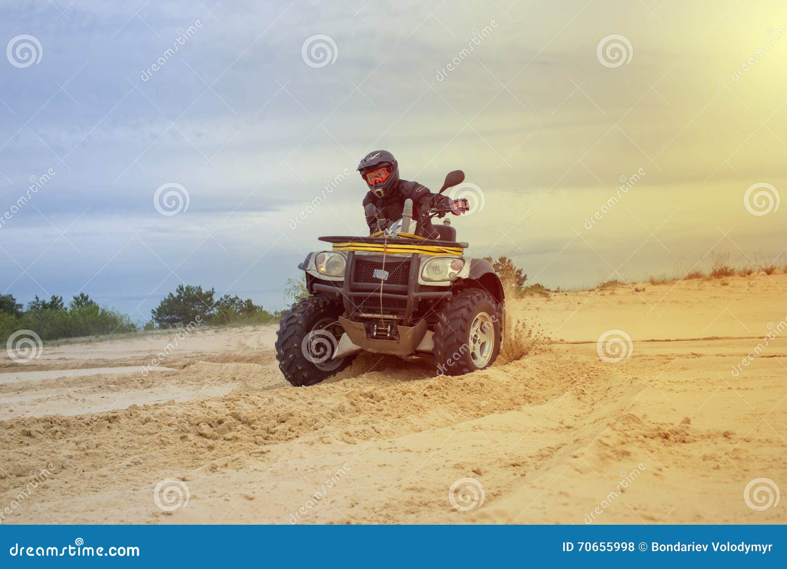 Racing ATV is sand. stock photo. Image of offroad, race 70655998