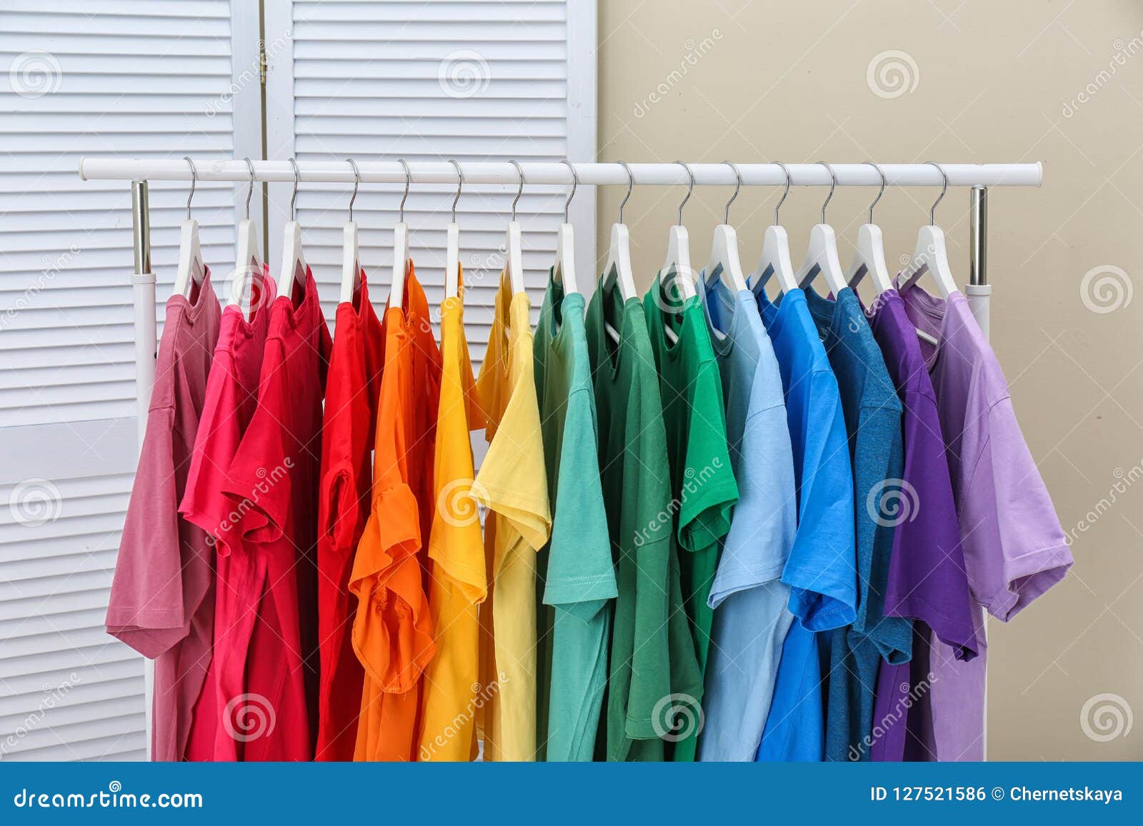 Rack Rainbow Clothes Hangers Indoors Stock Photo by ©belchonock 185291206