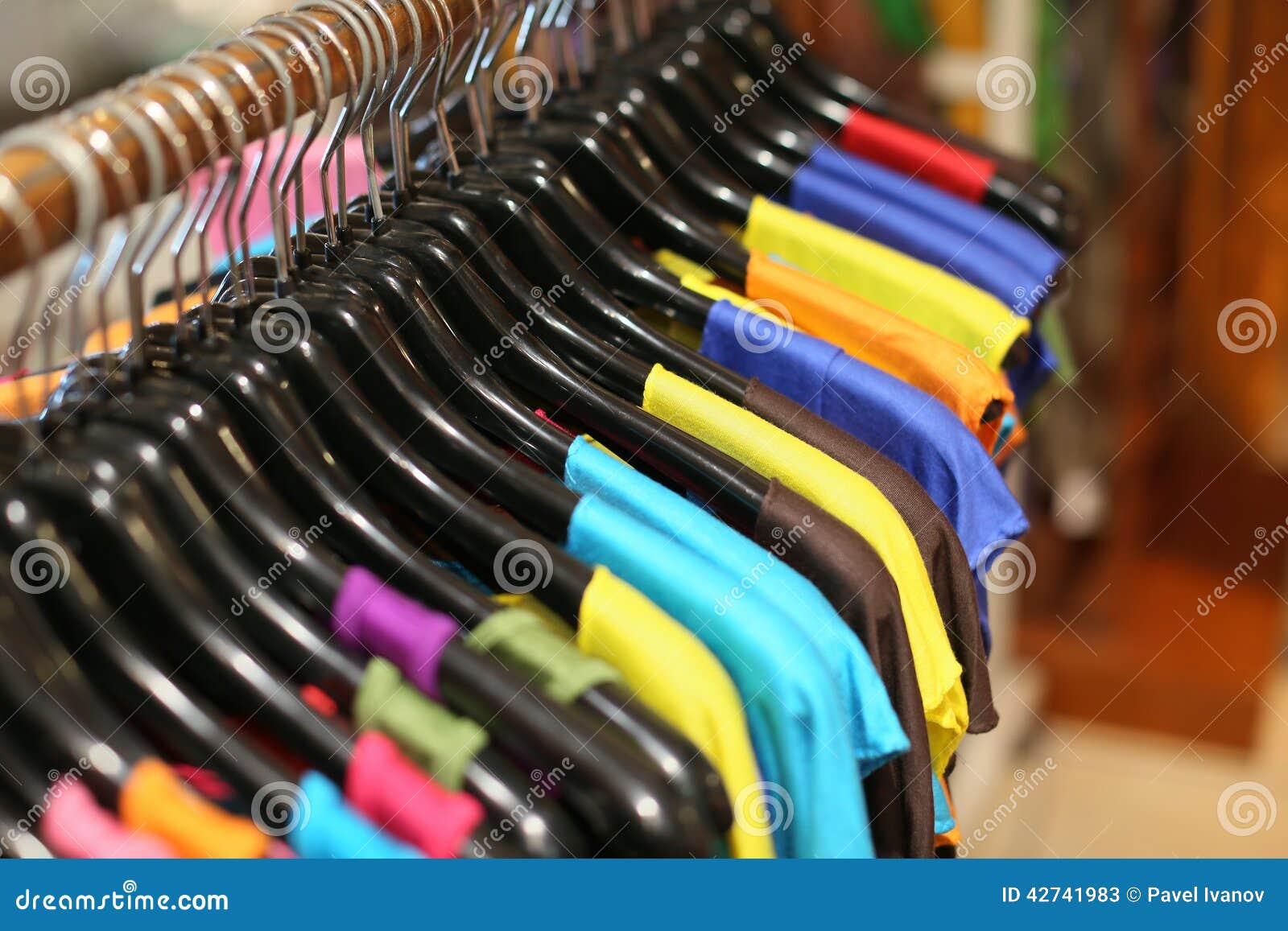 A Rack of Colorful Shirts Hanged for Sale at a Fair Stock Image - Image ...